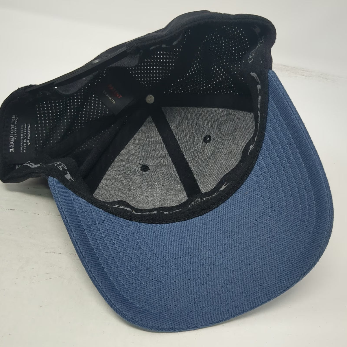TravisMathew Snapback Hat Black Blue One Size Flexfit 110 Perforated Logo Tech