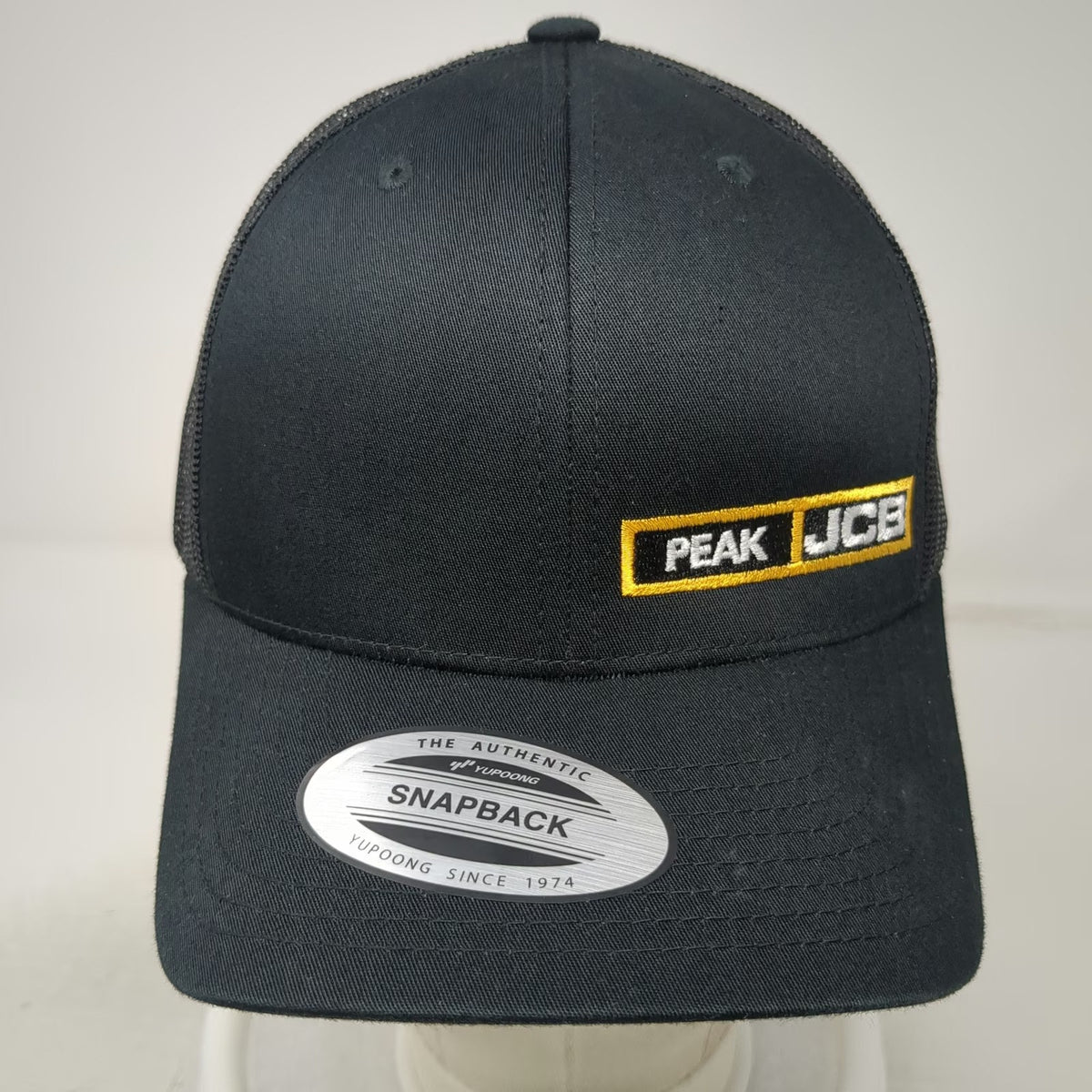 Yupoong Trucker Hat Black One Size Snapback Mesh Back Peak JCB Logo Structured