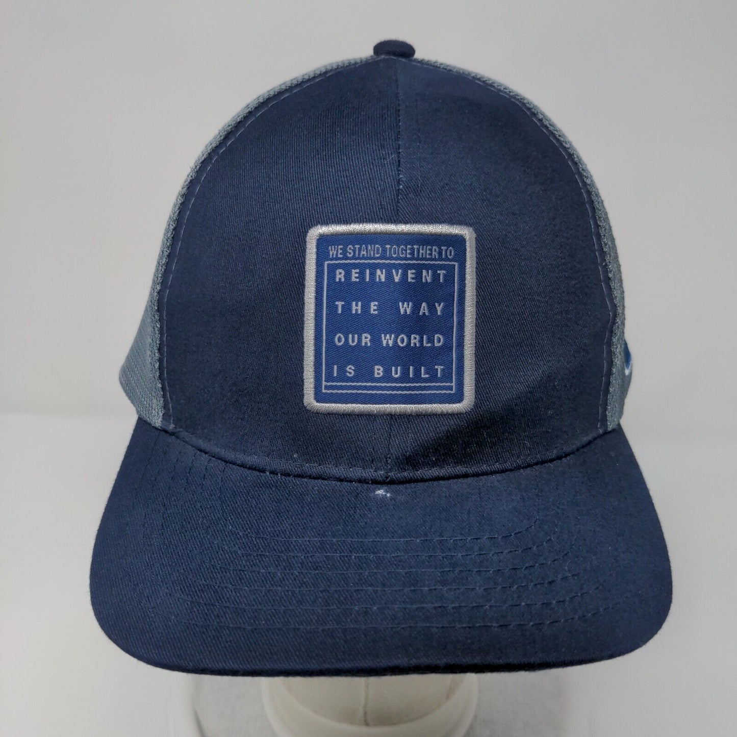 We Stand Together To Reinvent The Way Our World Is Built Trucker Hat Blue OSFA