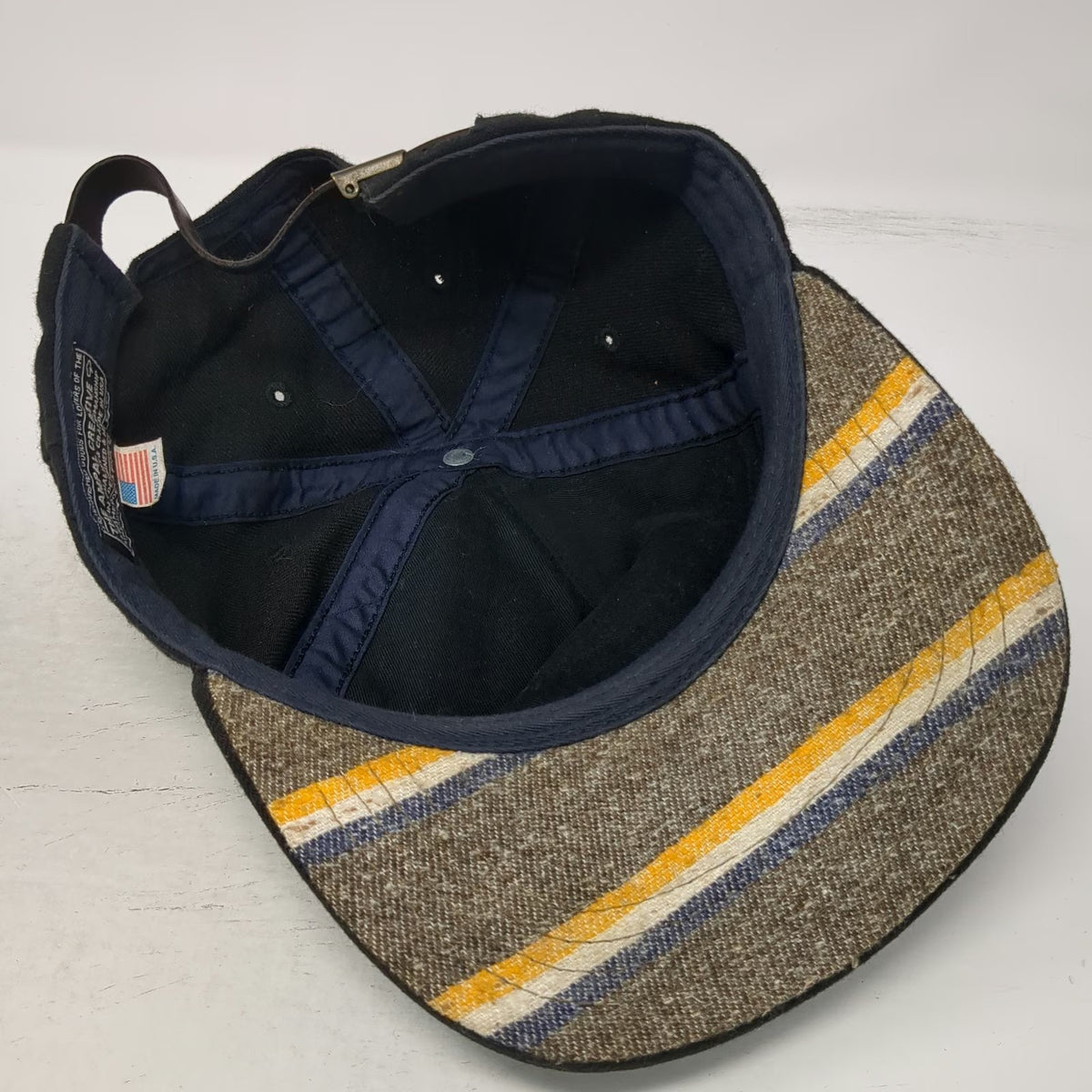 The Ampal Creative 5 Panel Black One Size Hat Gold Embroidery USA Weather
