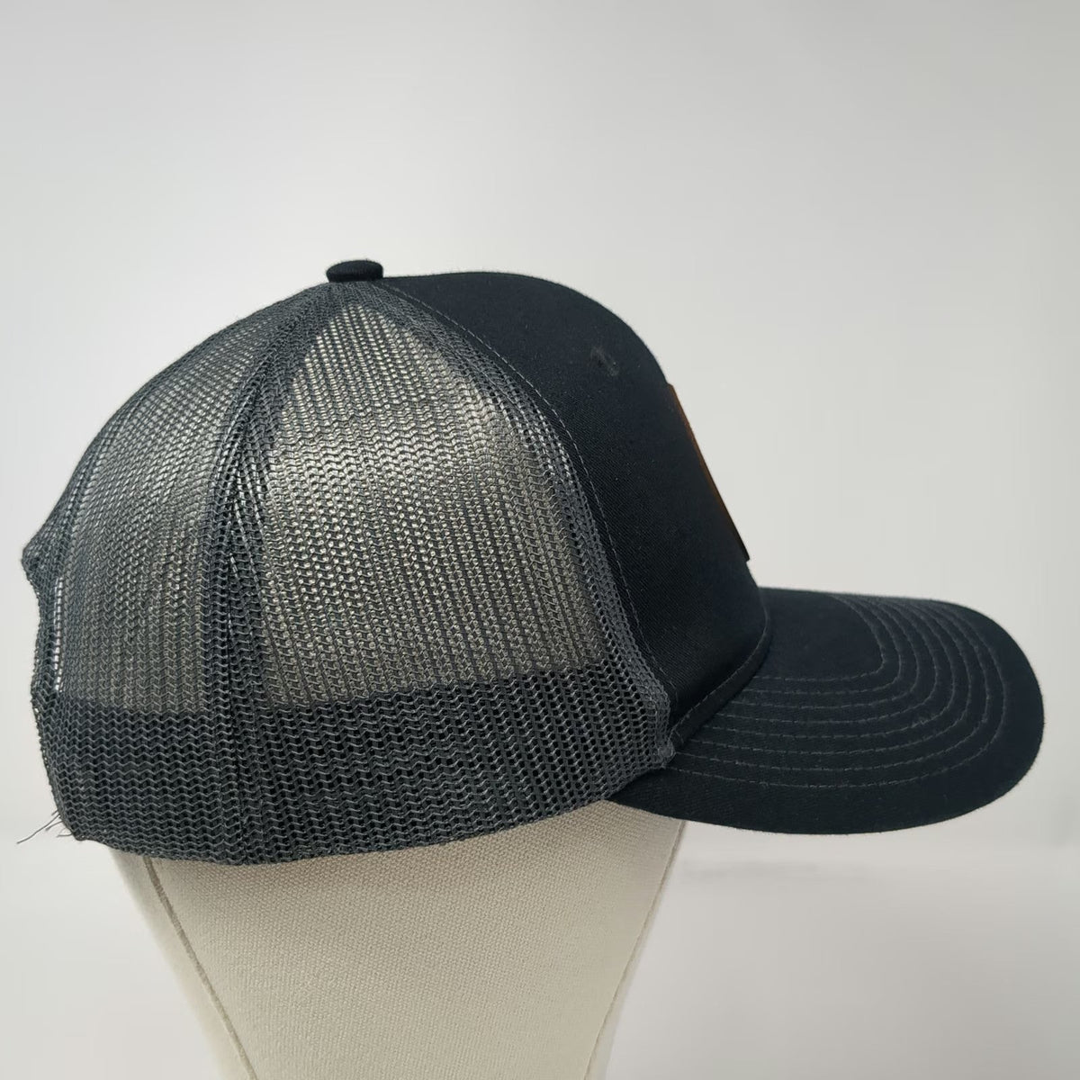 Port Authority Trucker Hat Black OSFM Shopper's Cafe Bar Grille Leather Patch