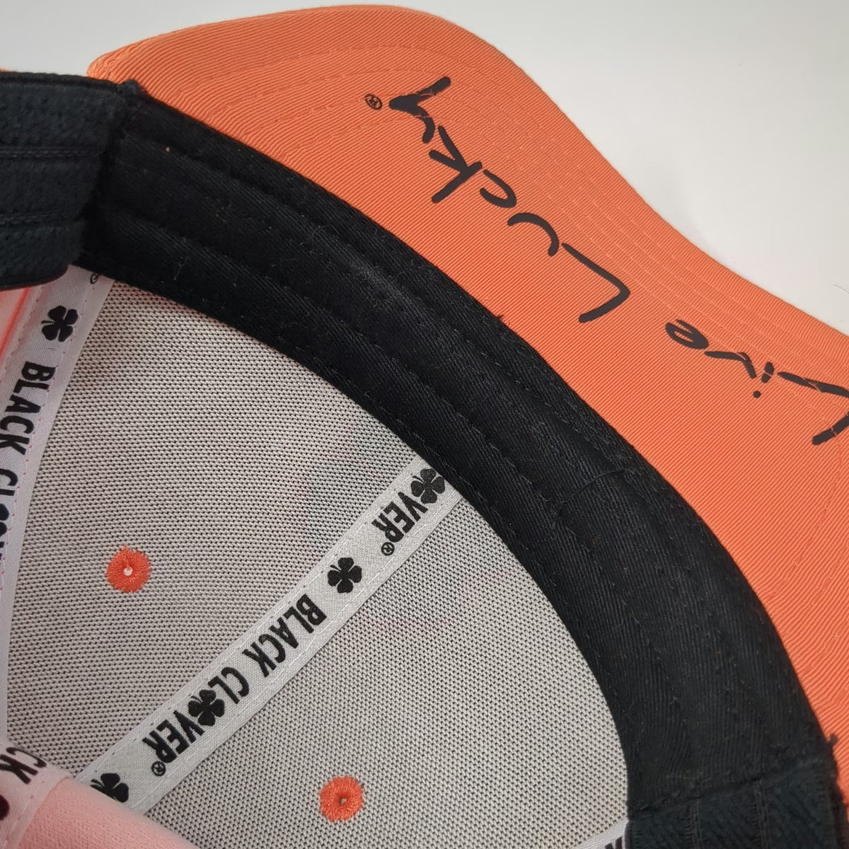 Black Clover Baseball Cap Orange One Size Stretch Fit Live Lucky Clover Logo Hat