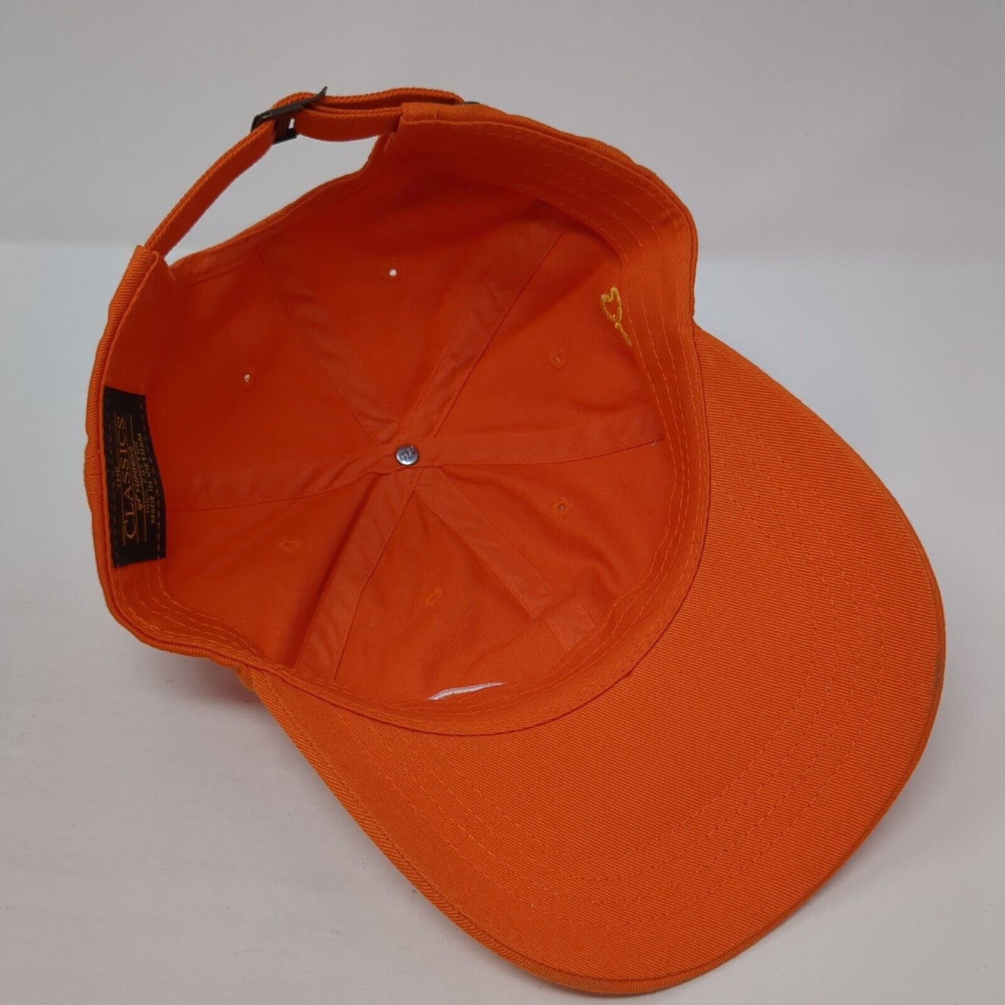 Trilogy at Wickenburg Ranch Slideback Hat Orange One Size Travis Mathew Yupoong