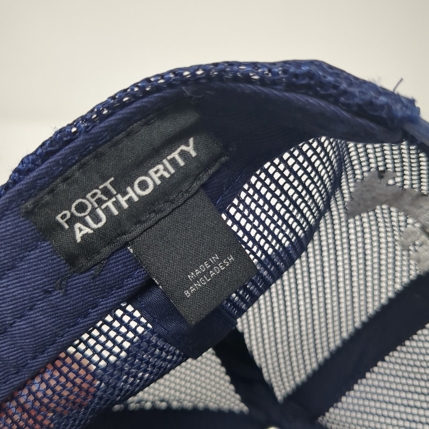 J.M Thomas Forest Products Trucker Hat Multi OS Adjustable Mesh Port Authority