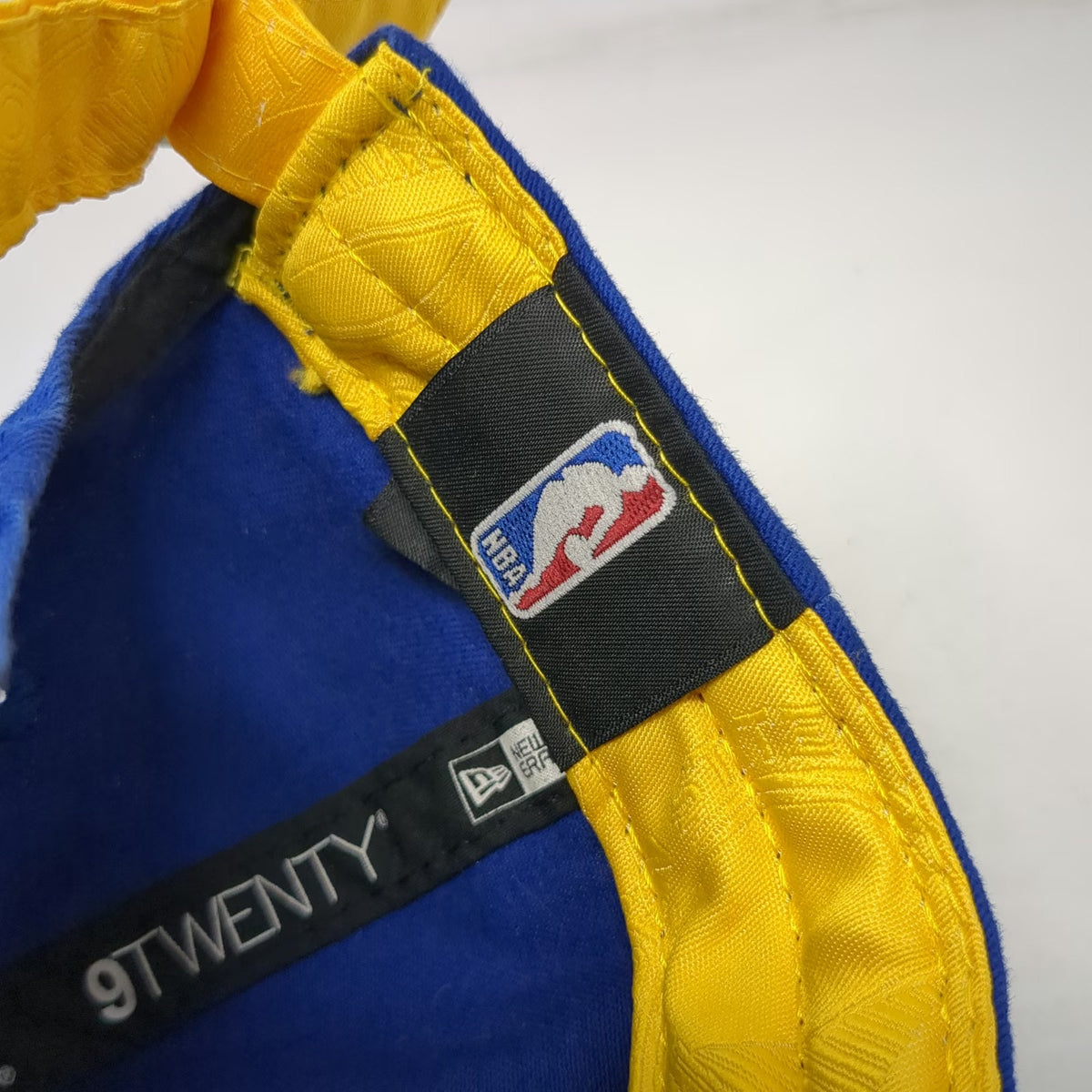 Golden State Warriors NBA New Era Cap Blue Yellow One Size 9TWENTY Logo Brim Hat