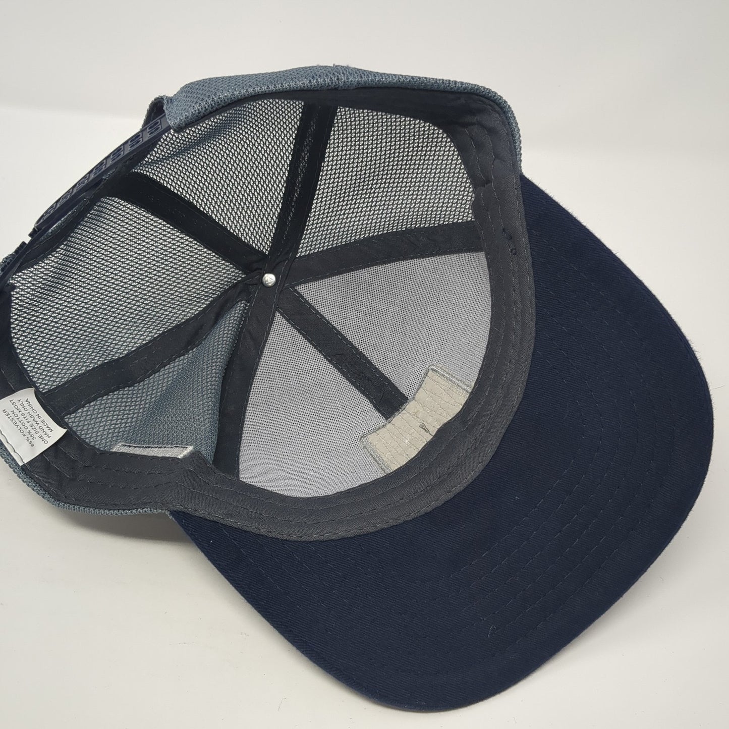 We Stand Together Reinvent The Way Our World Is Built Trucker Hat Blue OS Mesh