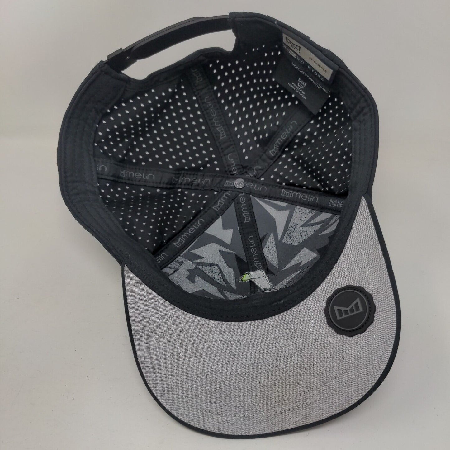 Melin Snapback Hat Black 58cm Embroidered Logo Laser Cut Adjustable