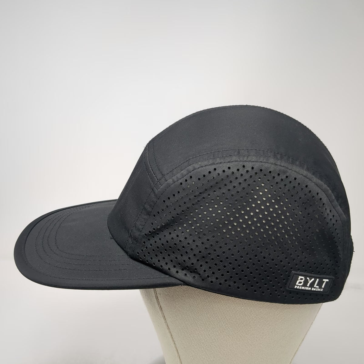 BYLT 5 Panel Black Hat One Size Slideback Laser Cut Mesh Premium Performance Cap