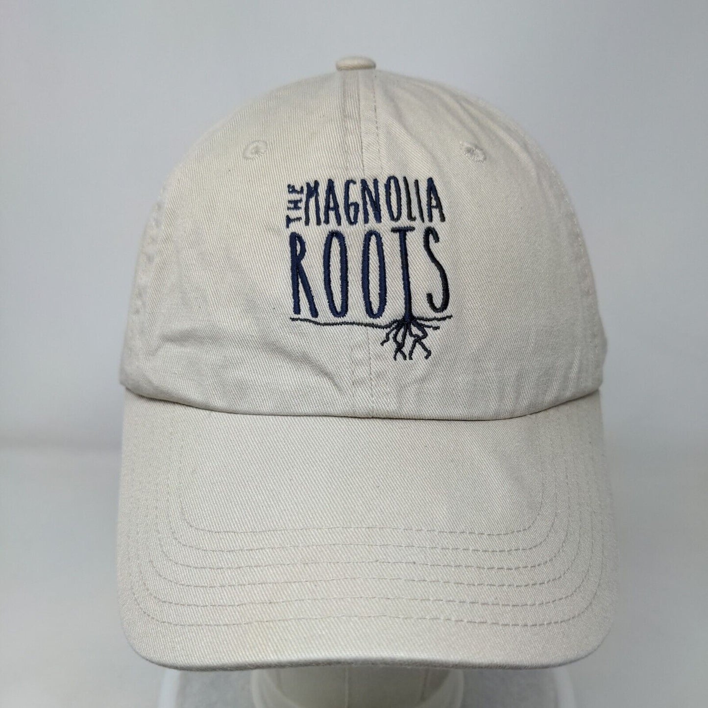 The Magnolia Roots Slideback Hat Tan One Size Embroidered 6 Panel Big X