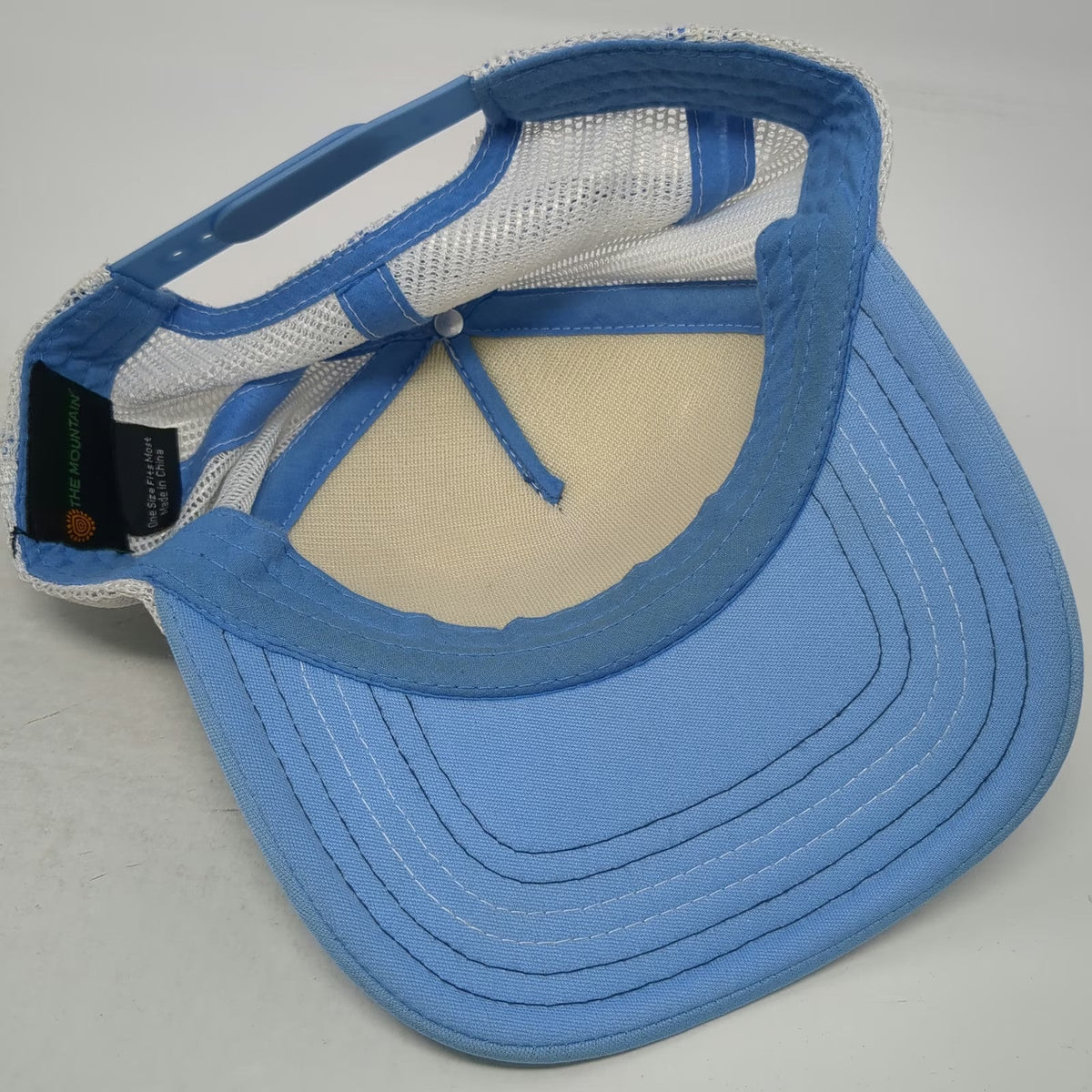 The Mountain Trucker Hat Blue One Size Zebra Savanna Print Wildlife Mesh Back