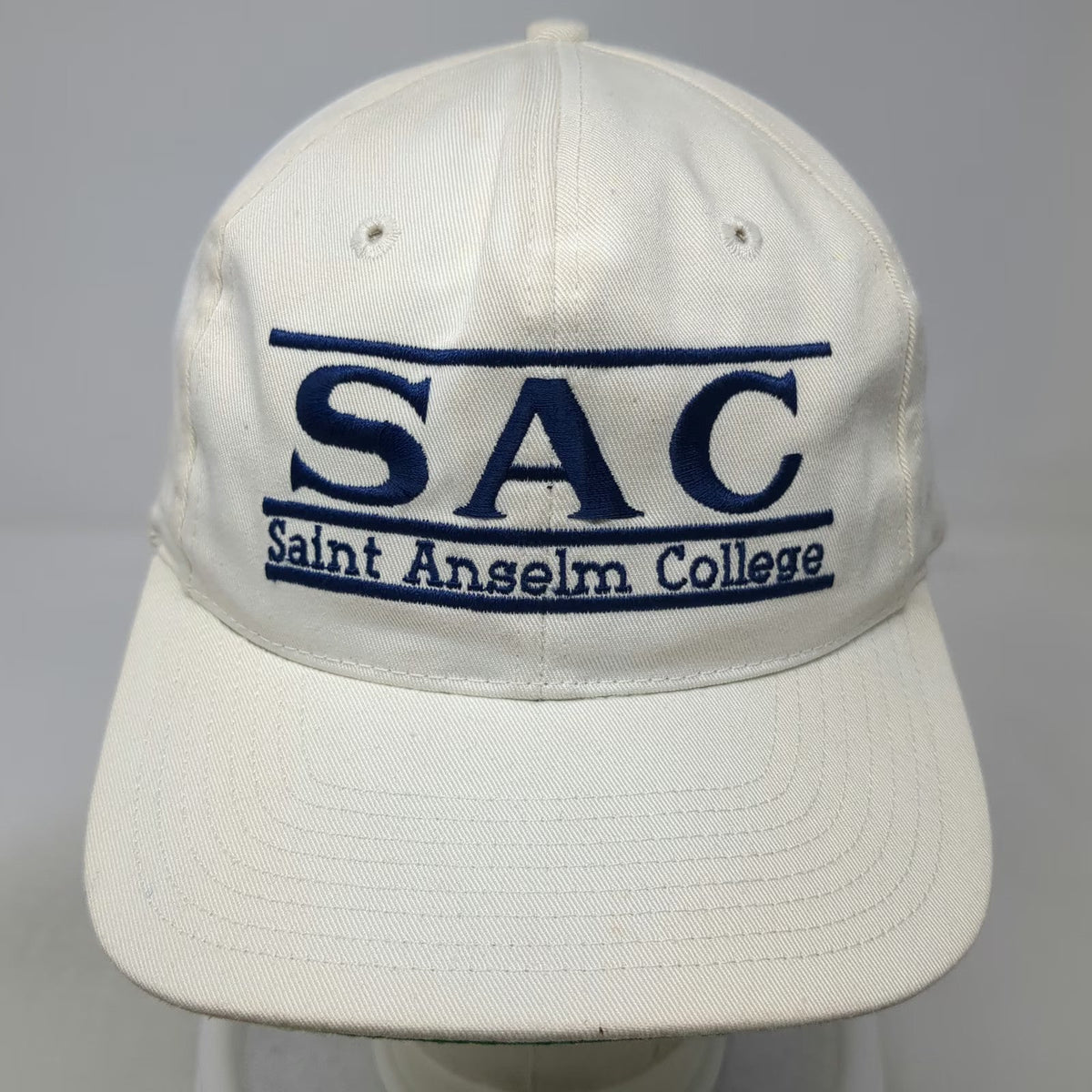 Saint Anselm College Hawks NCAA The Game Snapback White Hat One Size Green Brim