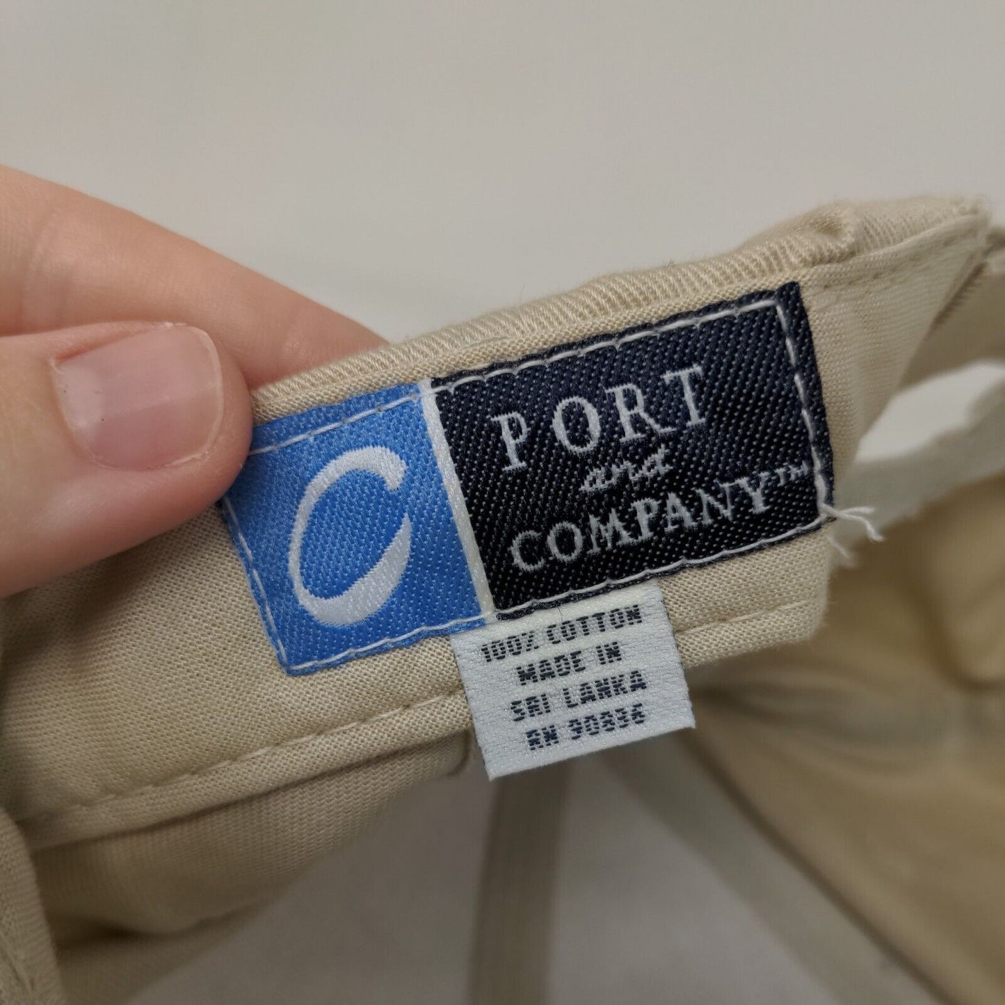 Stoeppelwerth & Associates Strapback Hat Tan Adjustable Embroidered Compass Logo