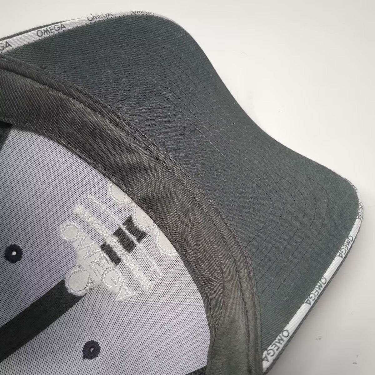 Omega Olympic Games Official Timekeeper Logo Gray White OSFA Slideback Cap Hat