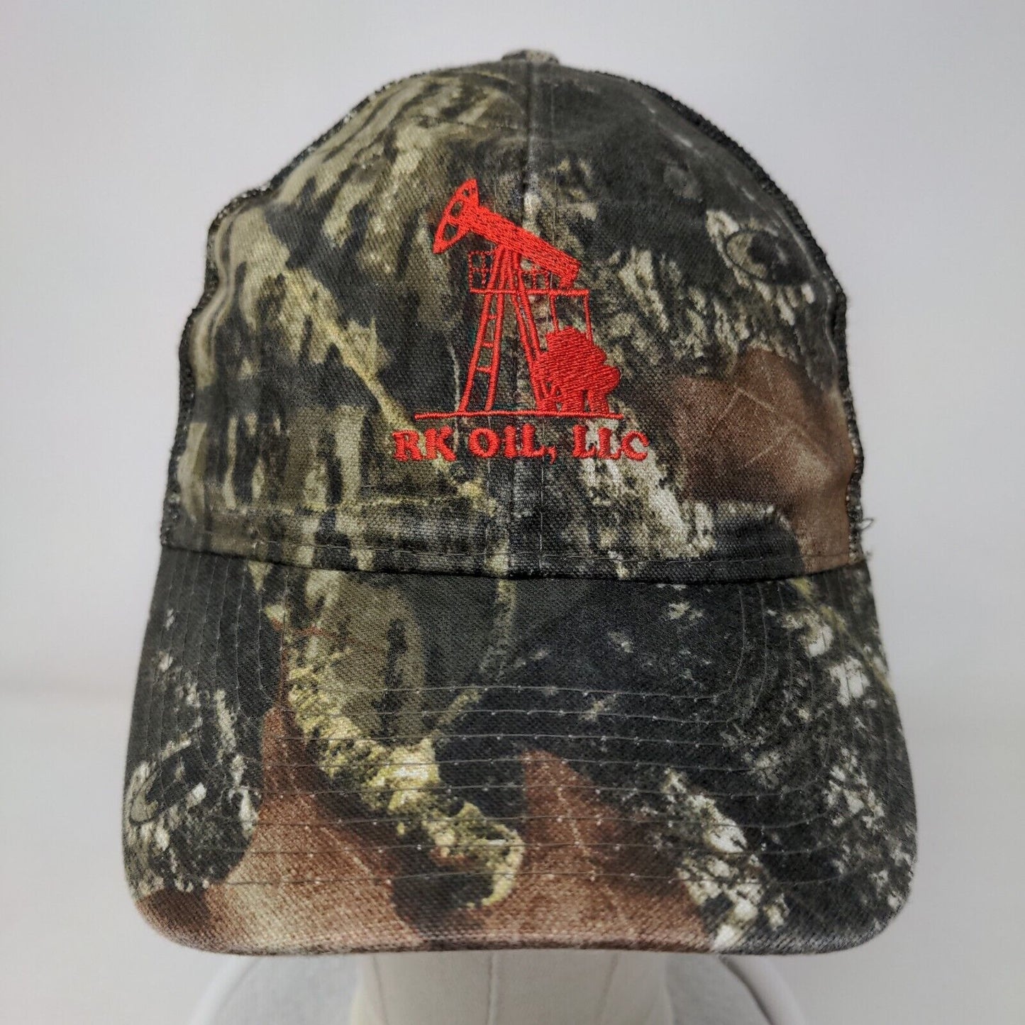 RK OIL LLC Strapback Mesh Back Trucker Hat Camo OSFM Embroidered