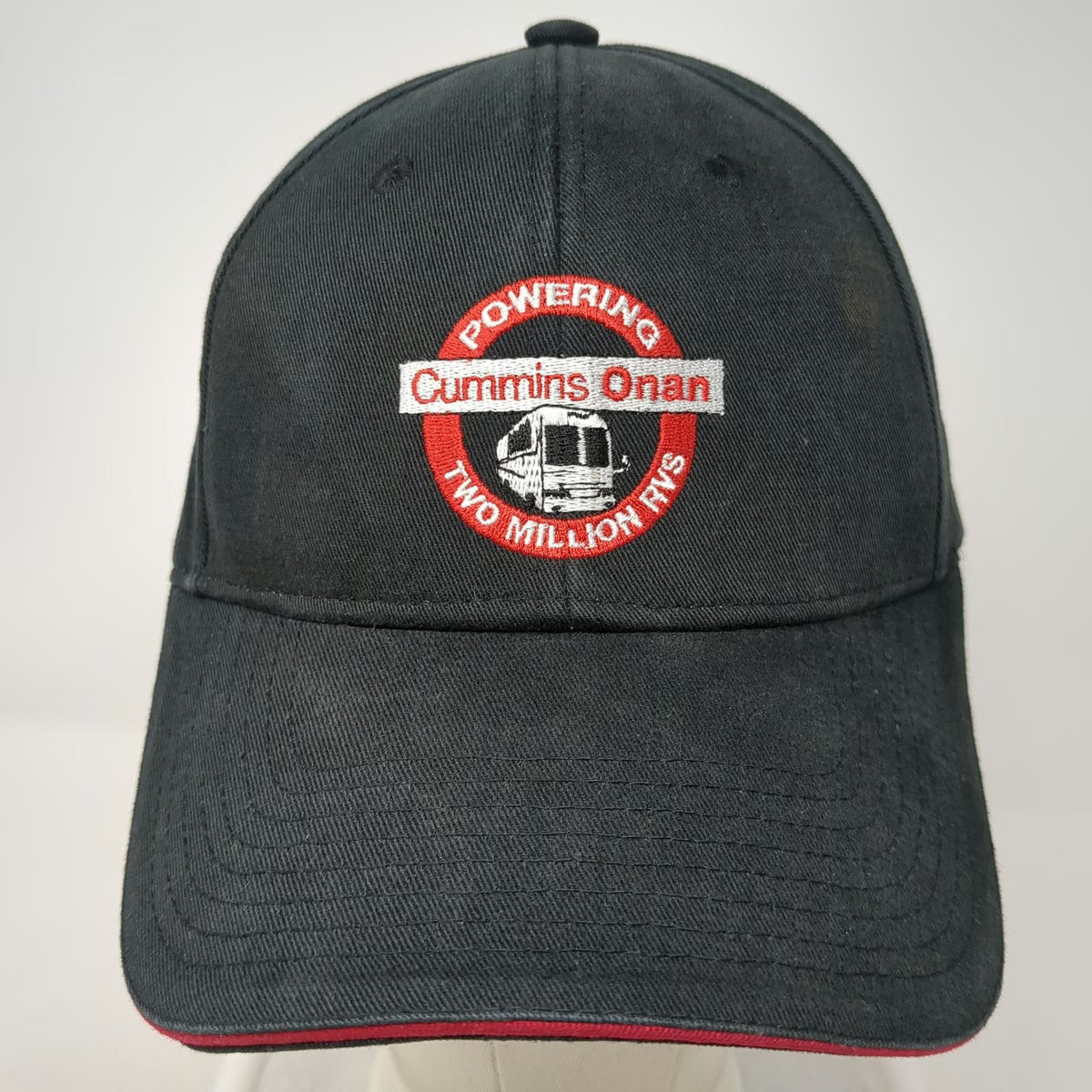 Cummins Onan Powering Two Million RVs Baseball Cap Black One Size Slideback Hat