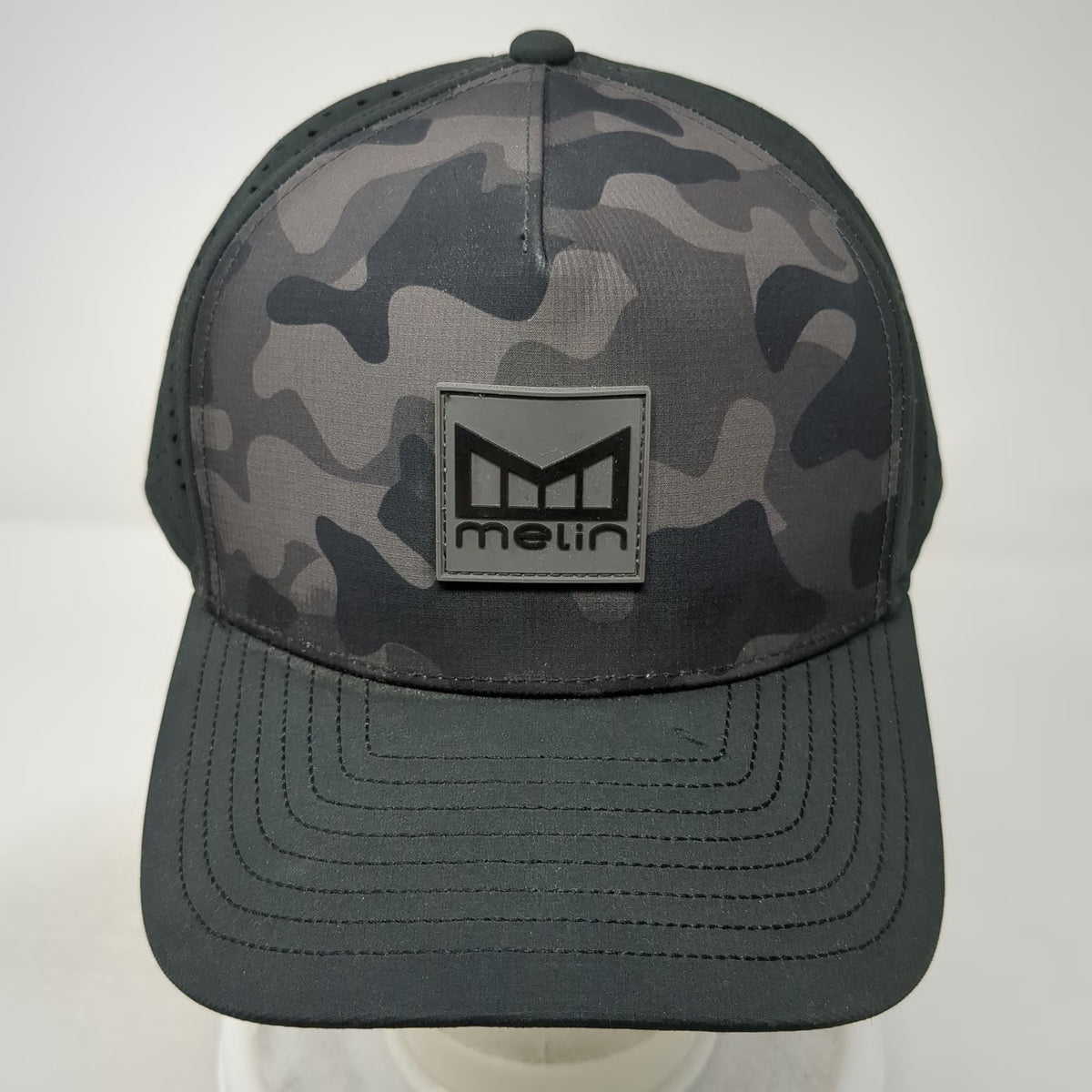Melin Trucker Hat Black Gray OSFM Camo Hydro Perforated Rubber Logo Adjustable