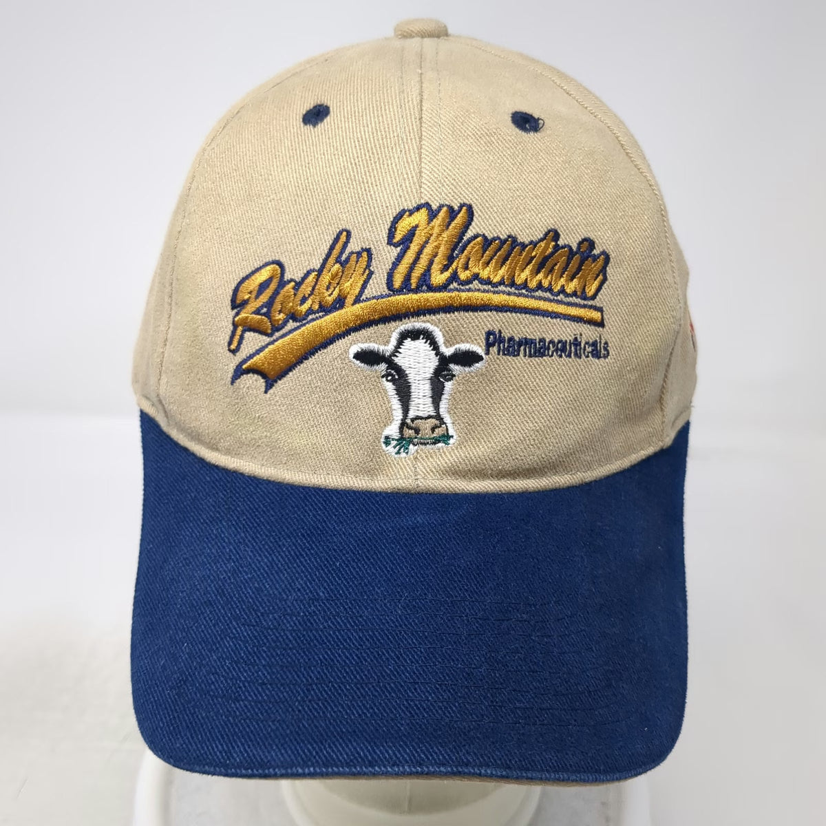 The Hat Source Baseball Cap Beige Blue One Size Cow Rocky Mountain Pharma Hat