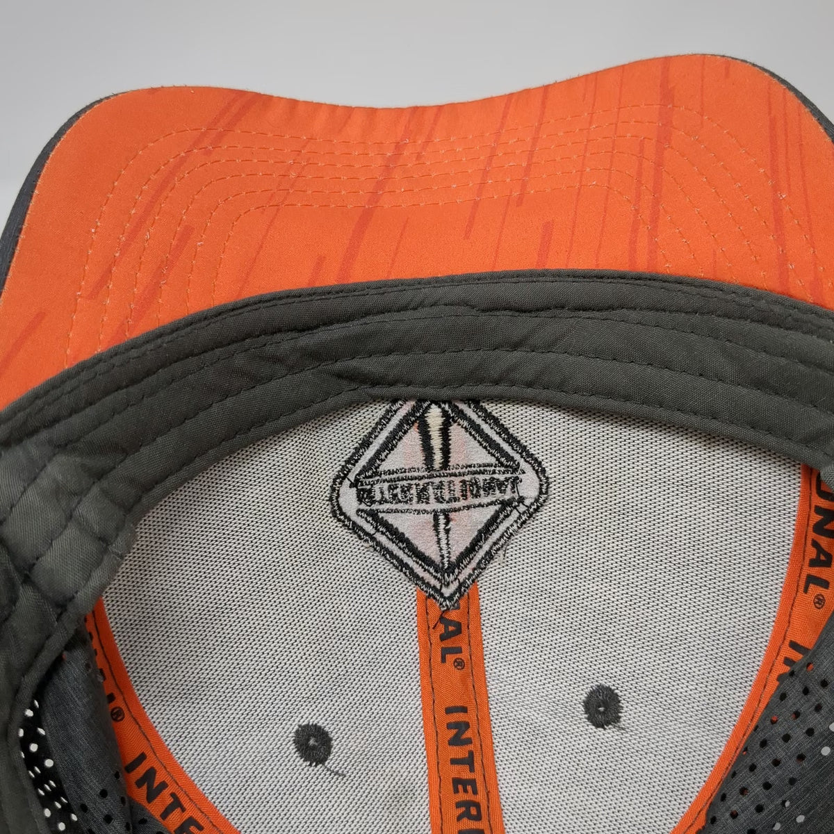 International Trucker Hat Gray One Size Perforated Snapback Orange Underbrim