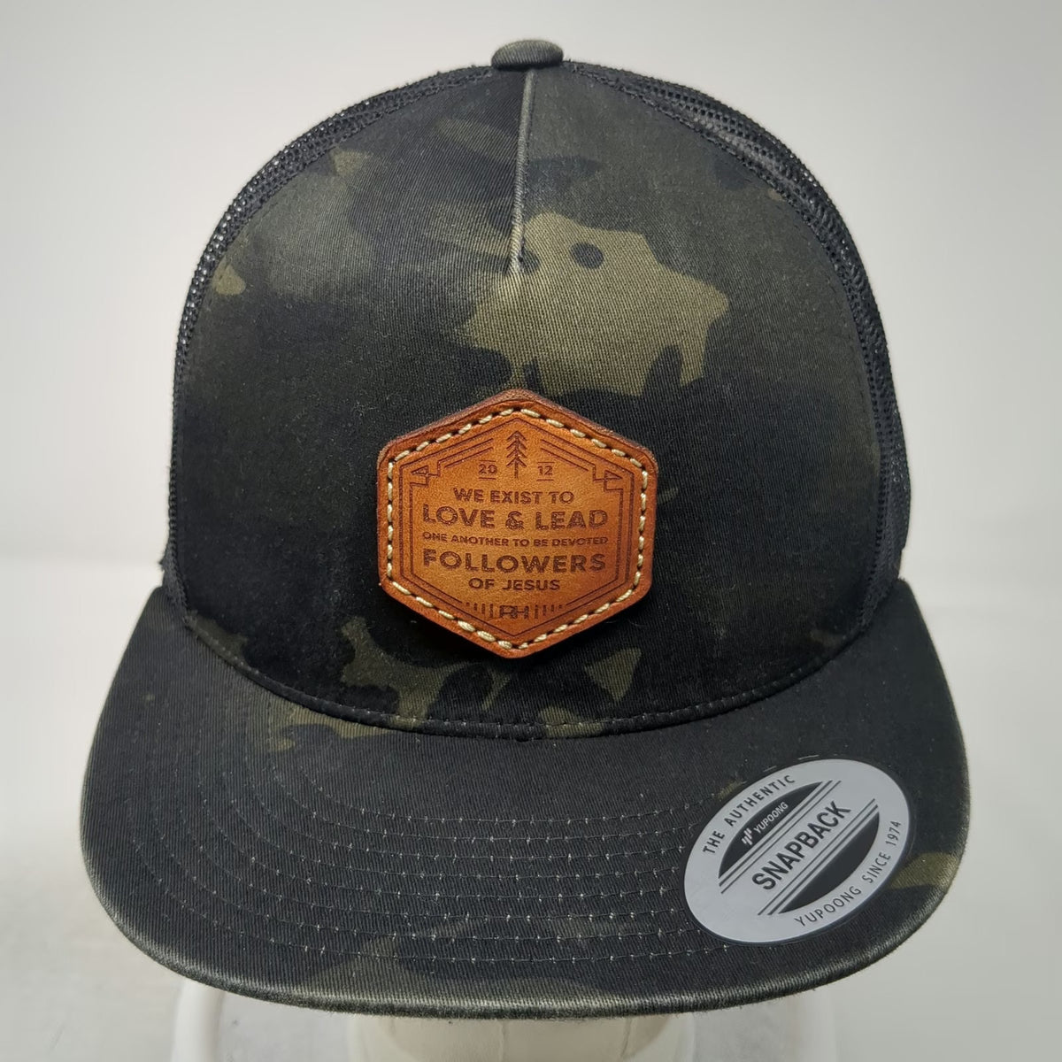 Yupoong Trucker Hat Black One Size Camo Leather Followers of Jesus Snapback Mesh