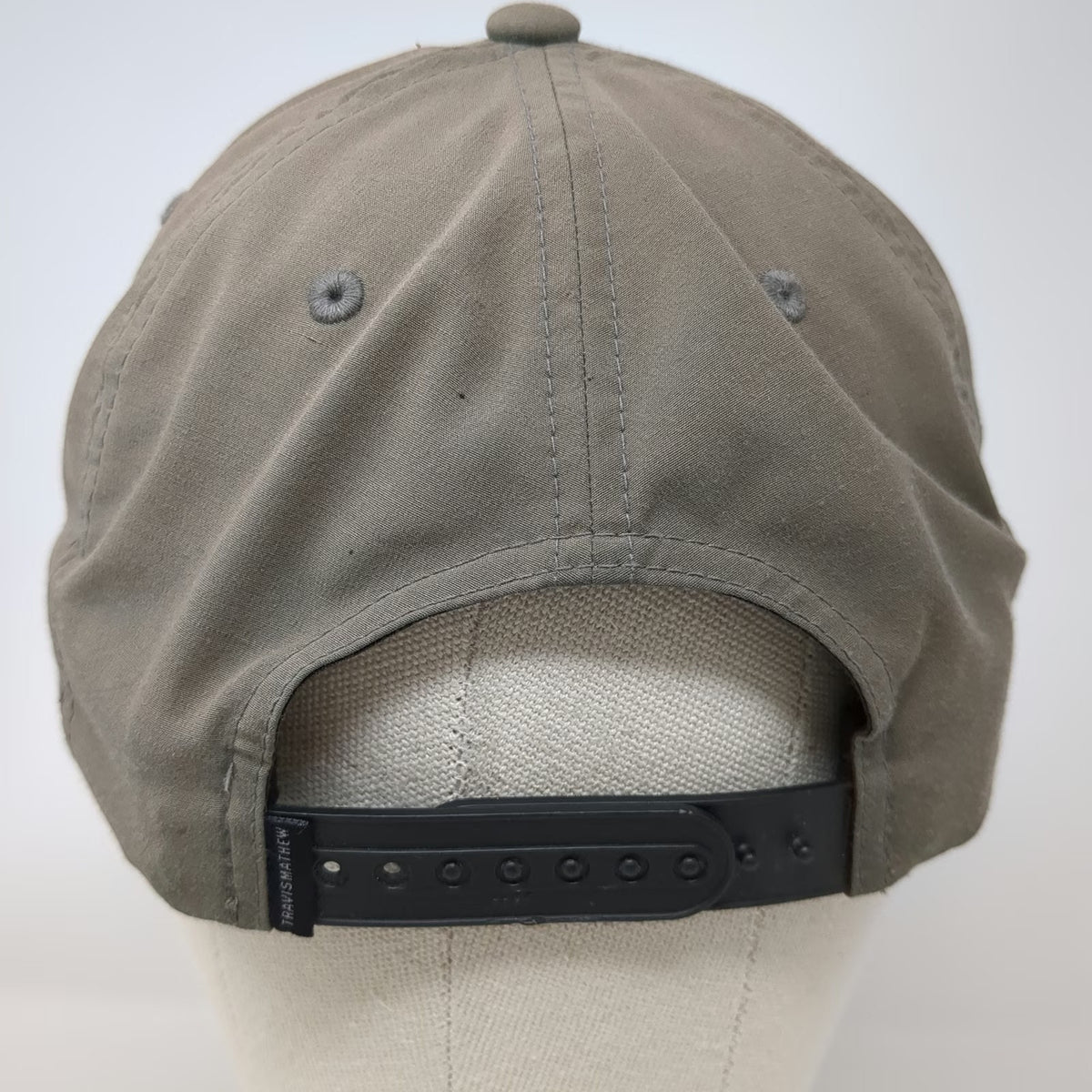 TravisMathew Snapback Beige OSFM Flexfit 110 Rubber Logo Performance Golf Hat