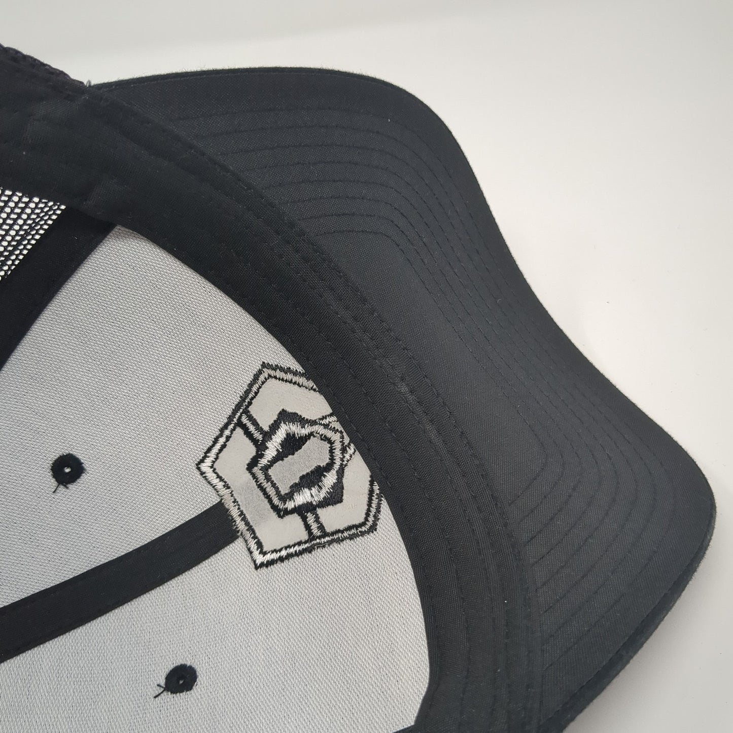 The Classics Yupoong Snapback Trucker Hat Black One Size Embroidered