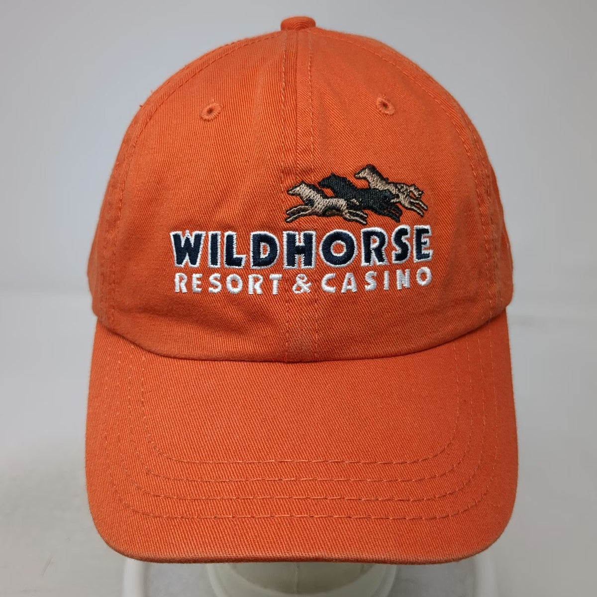 American Dry Goods Wildhorse Resort Casino Orange One Size Baseball Cap Bird Hat