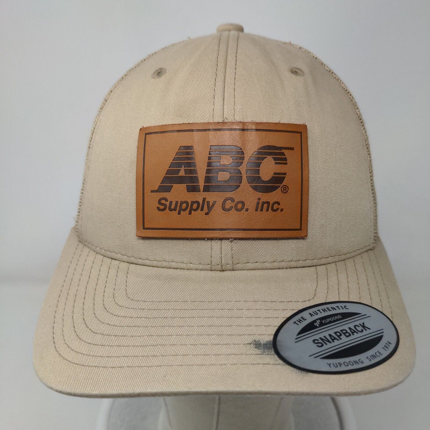 ABC Supply Co. Inc Snapback Mesh Back Trucker Hat Tan One Size Leather Patch