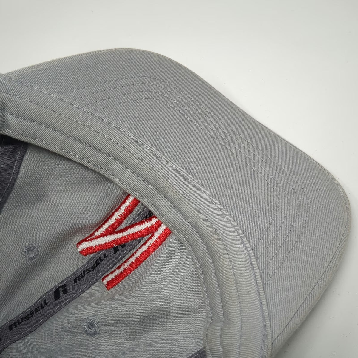 Nebraska Cornhuskers NCAA Russell Gray One Size Hat N Logo Brim Text Slideback