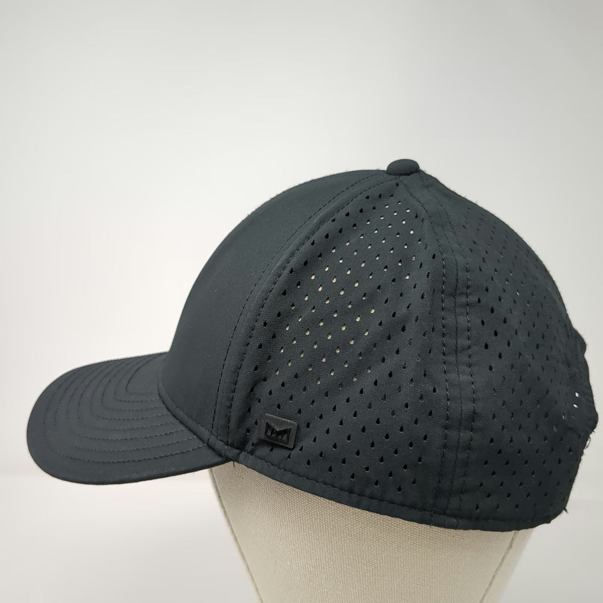Melin Trucker Hat Black Perforated Hydro Performance Snapback Sport