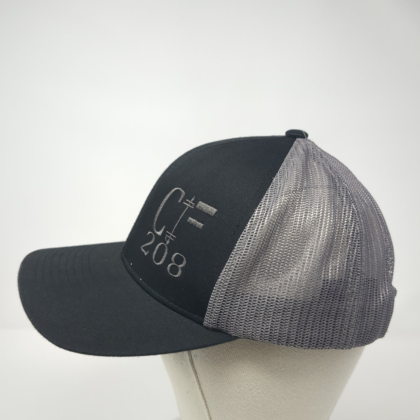 C 208 Snapback Trucker Hat Black One Size Adjustable Embroidered Mesh Back