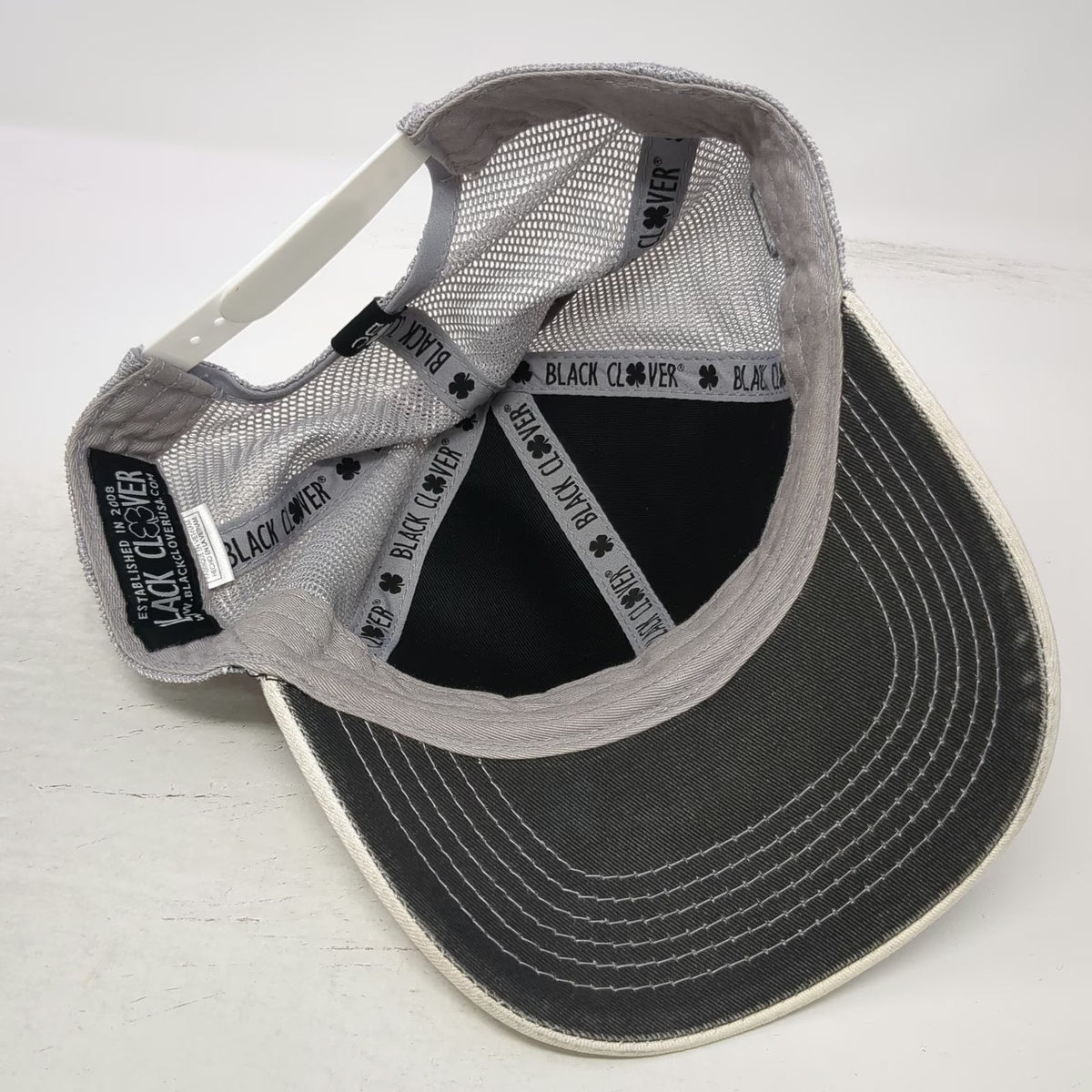 Black Clover Trucker Hat Gray White One Size Bingham Healthcare Live Lucky