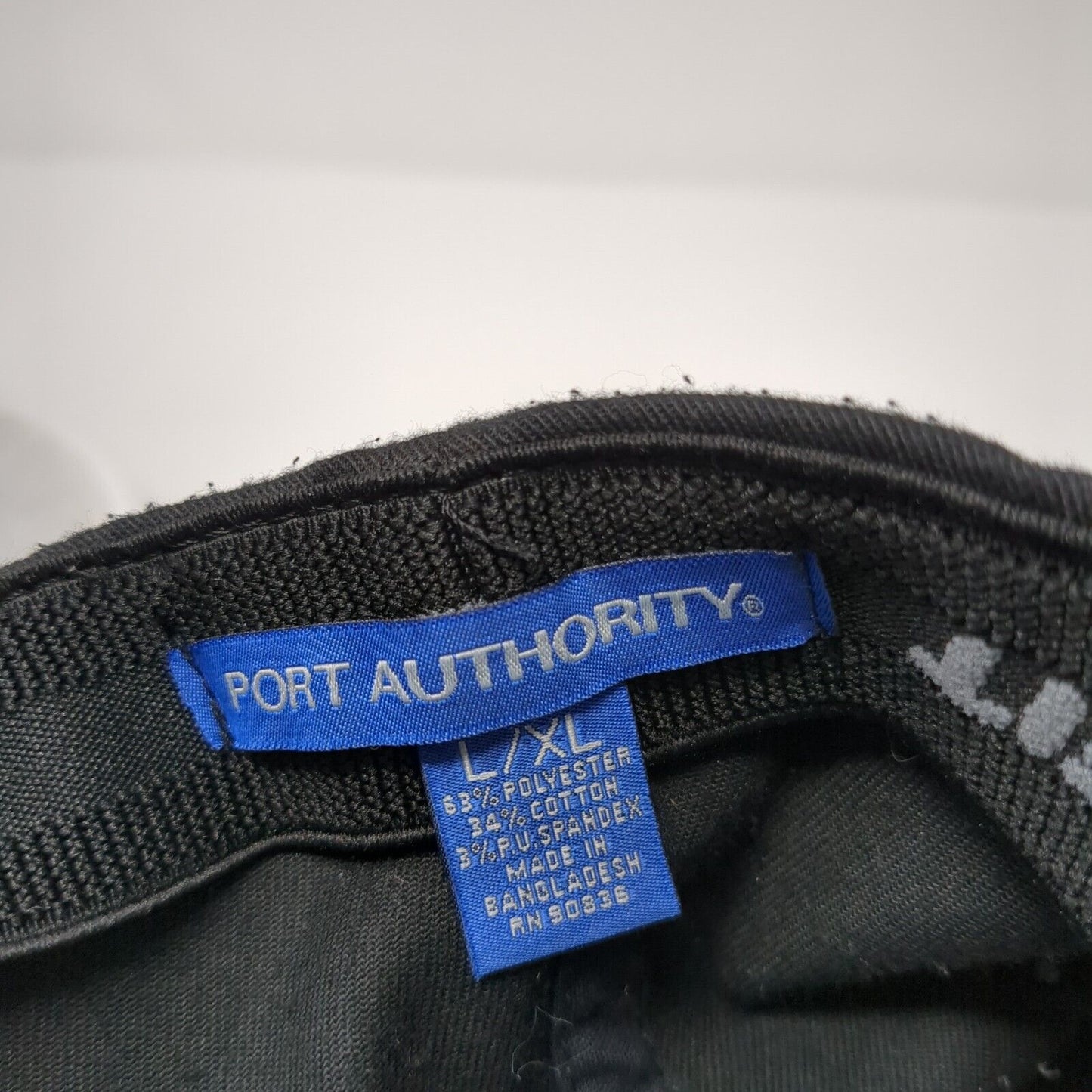 Custom Excavating 25 Years Fitted Hat Black L/XL Flexfit Port Authority