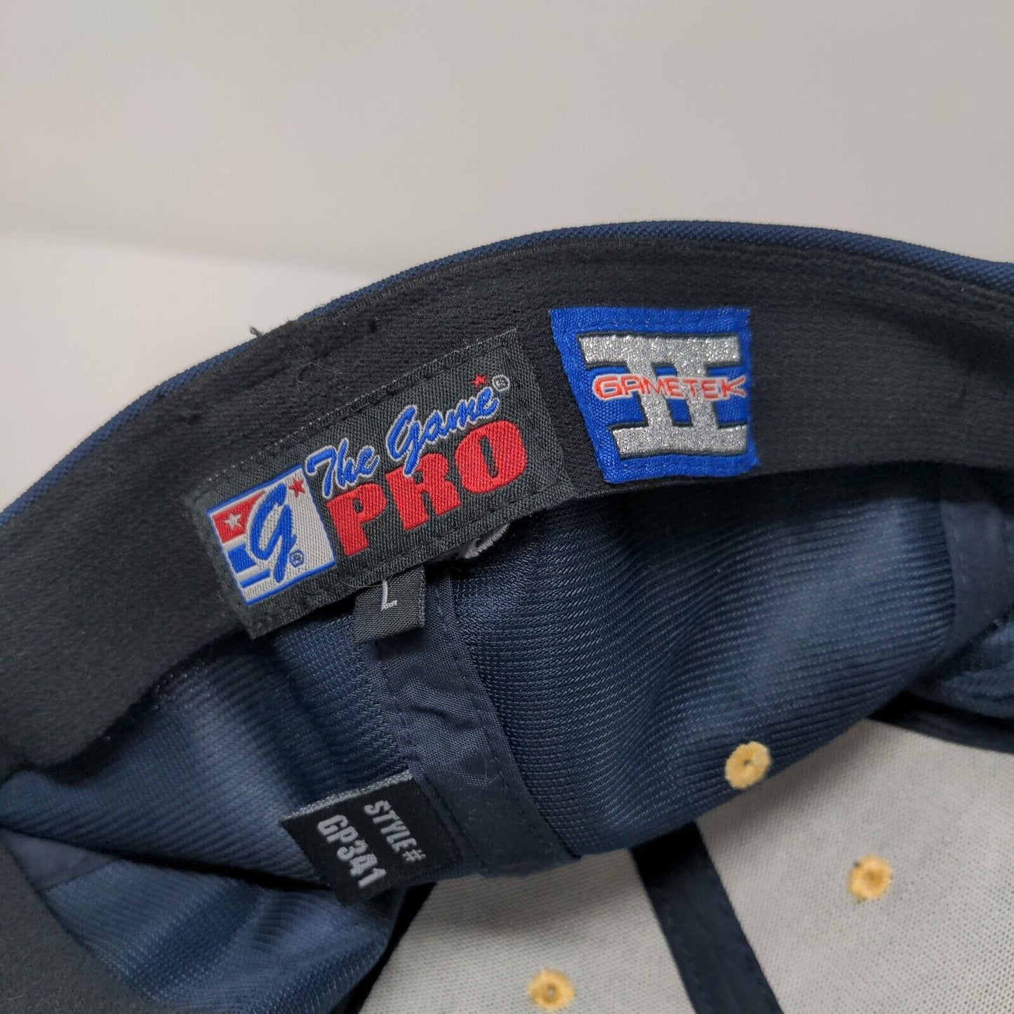 The Game Pro Fitted Hat Blue Large Embroidered Logo Solid Vent Holes