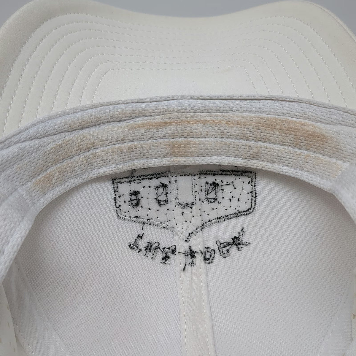 The Rock Store White Trucker Hat One Size Perforated Performance Snapback Hat