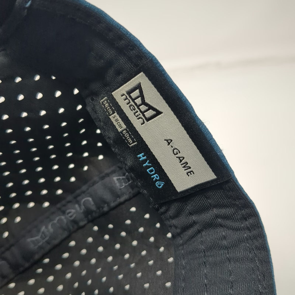 Melin A-Game Hydro Trucker Hat Blue One Size Perforated Performance Snapback