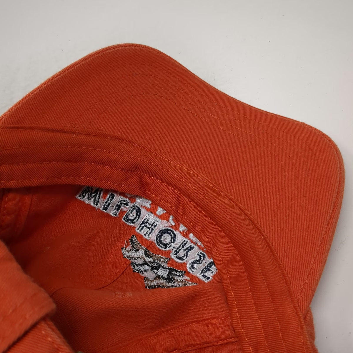 American Dry Goods Wildhorse Resort Casino Orange One Size Baseball Cap Bird Hat