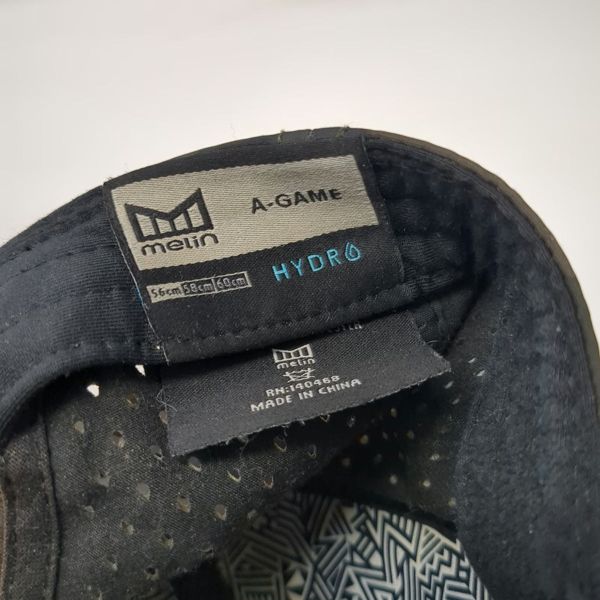 Melin Trucker Hat Green Camo Perforated A-Game Hydro Snapback