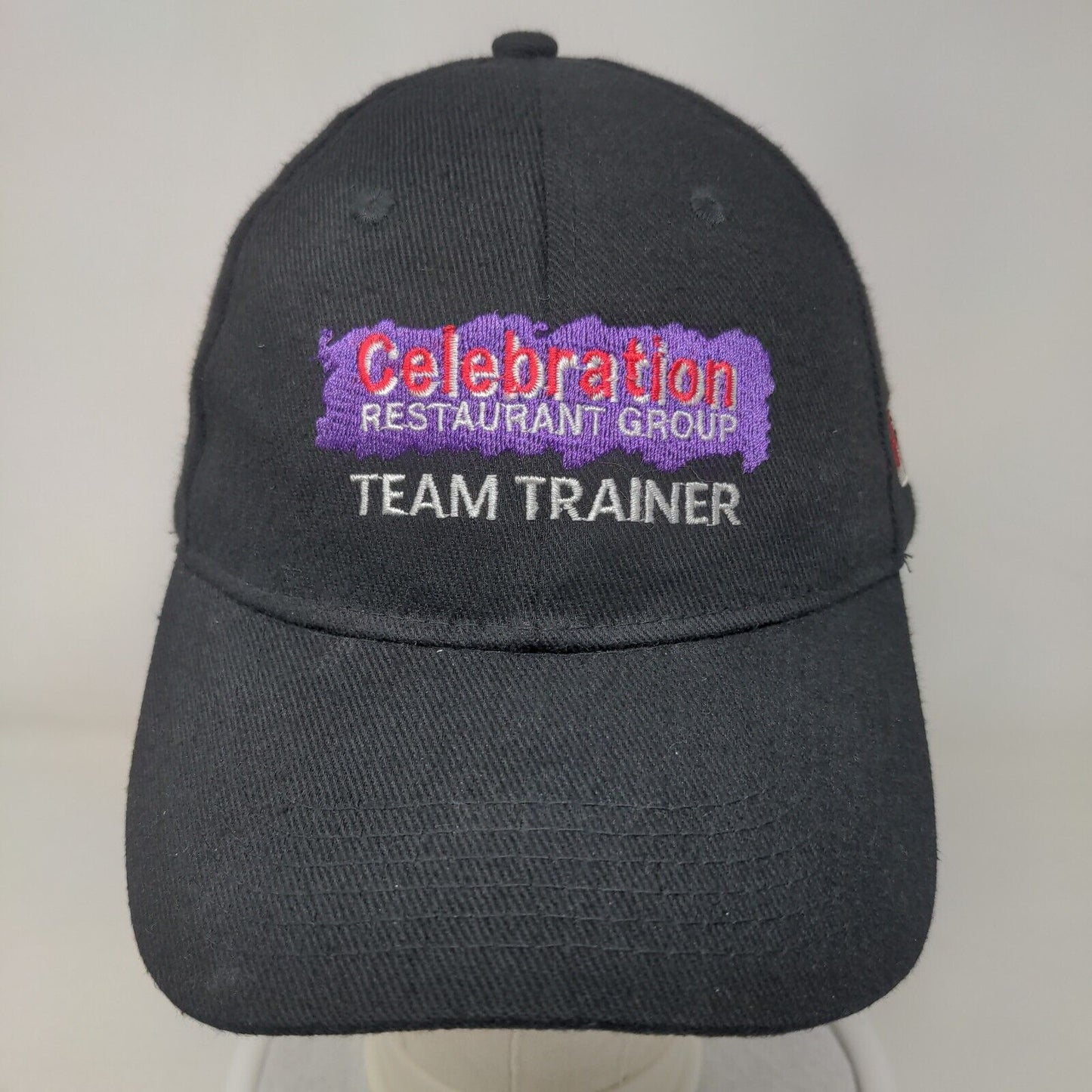 Celebration Restaurant Group Team Trainer Strapback Hat Black OS Embroidered