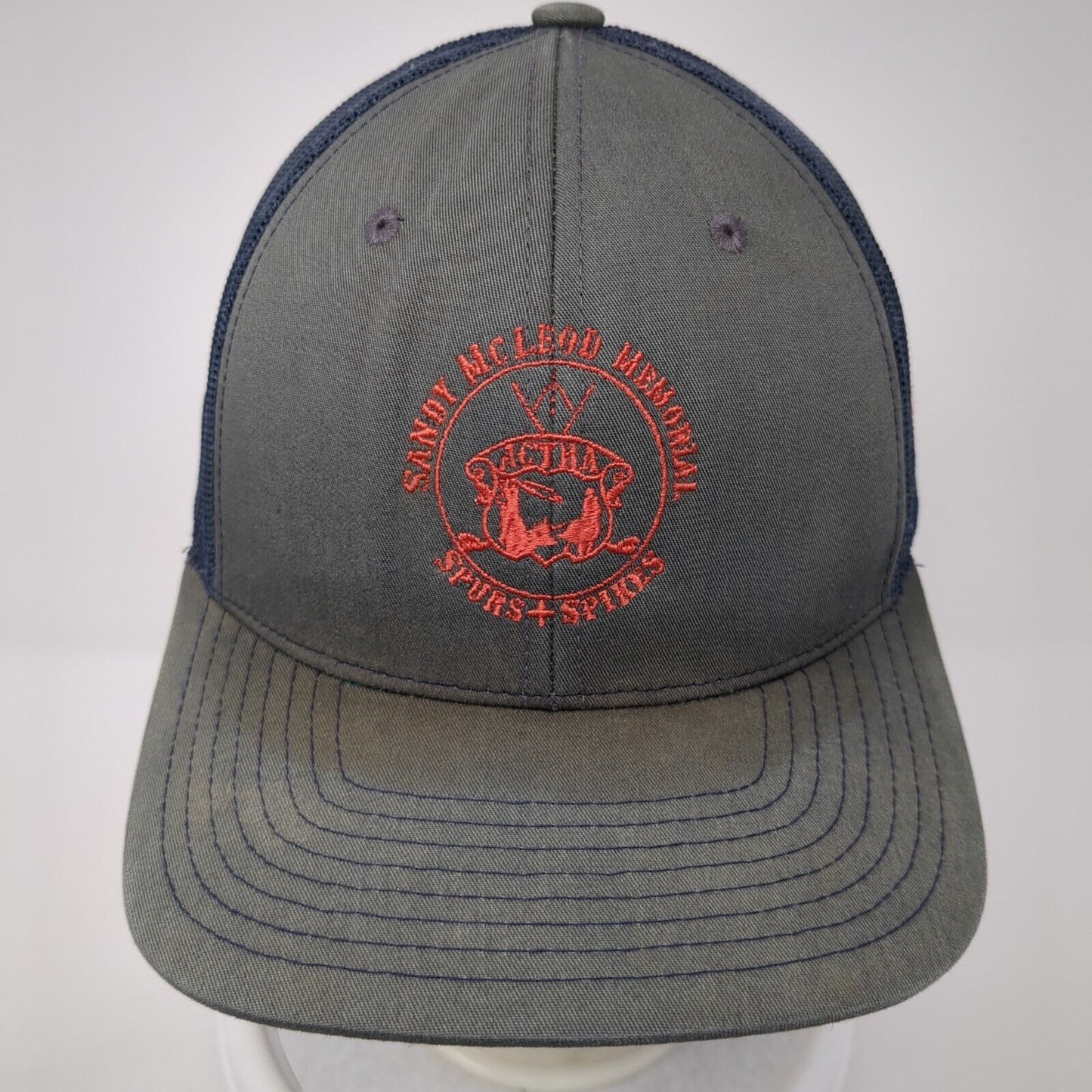Sandy McLeod Memorial Spurs & Spikes Snapback Trucker Hat Multi OS Richardson