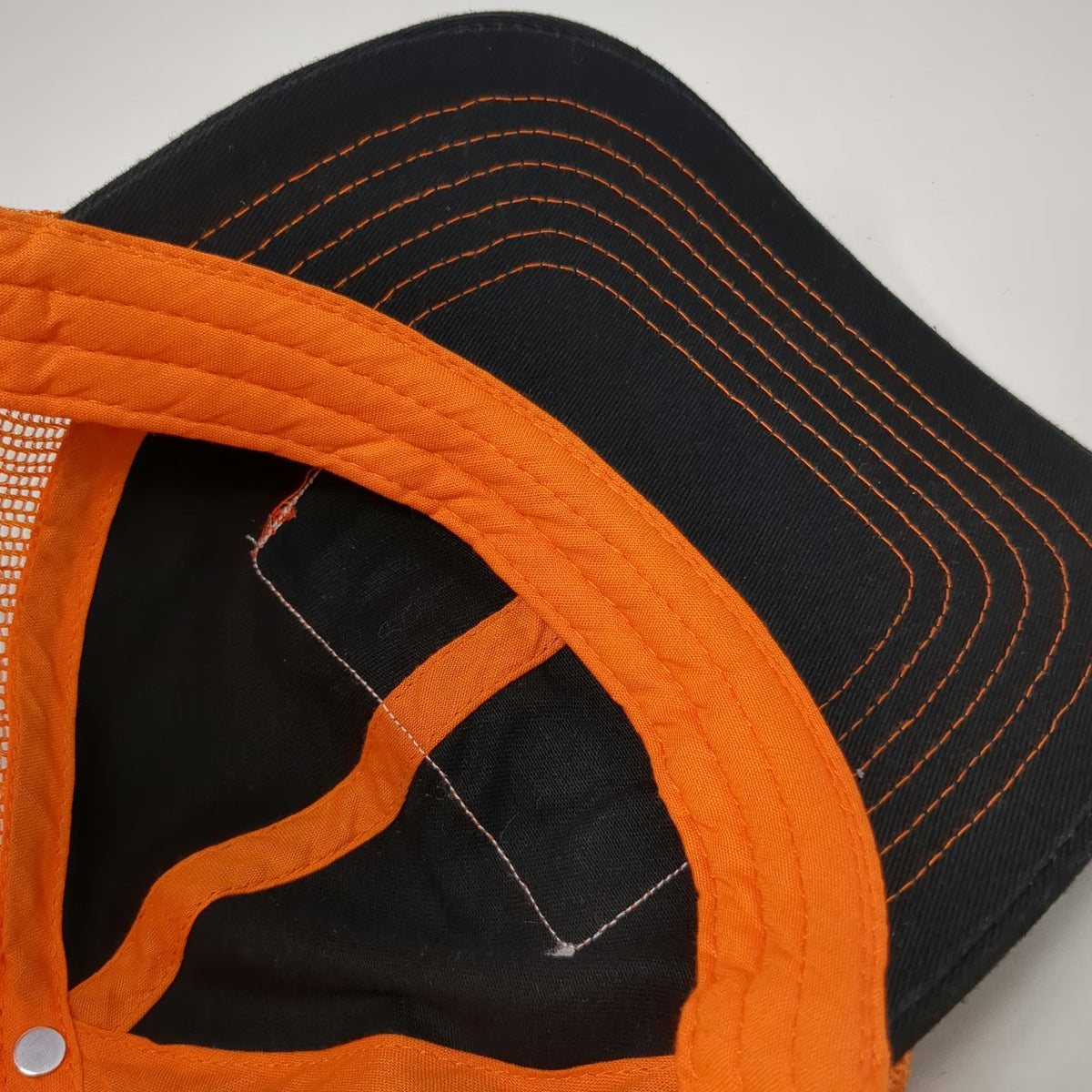 K-Products Trucker Hat Black Orange One Size Sno-Cat Patch Contrast Stitching