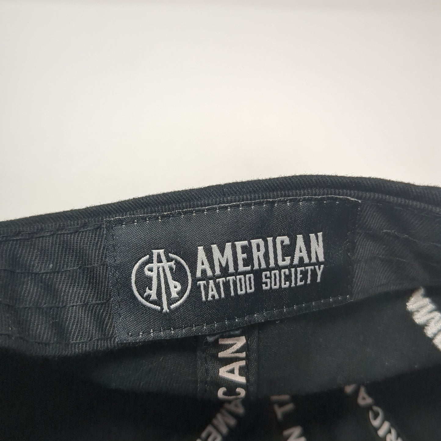 American Tattoo Society Slideback Hat Black One Size Solid Distressed