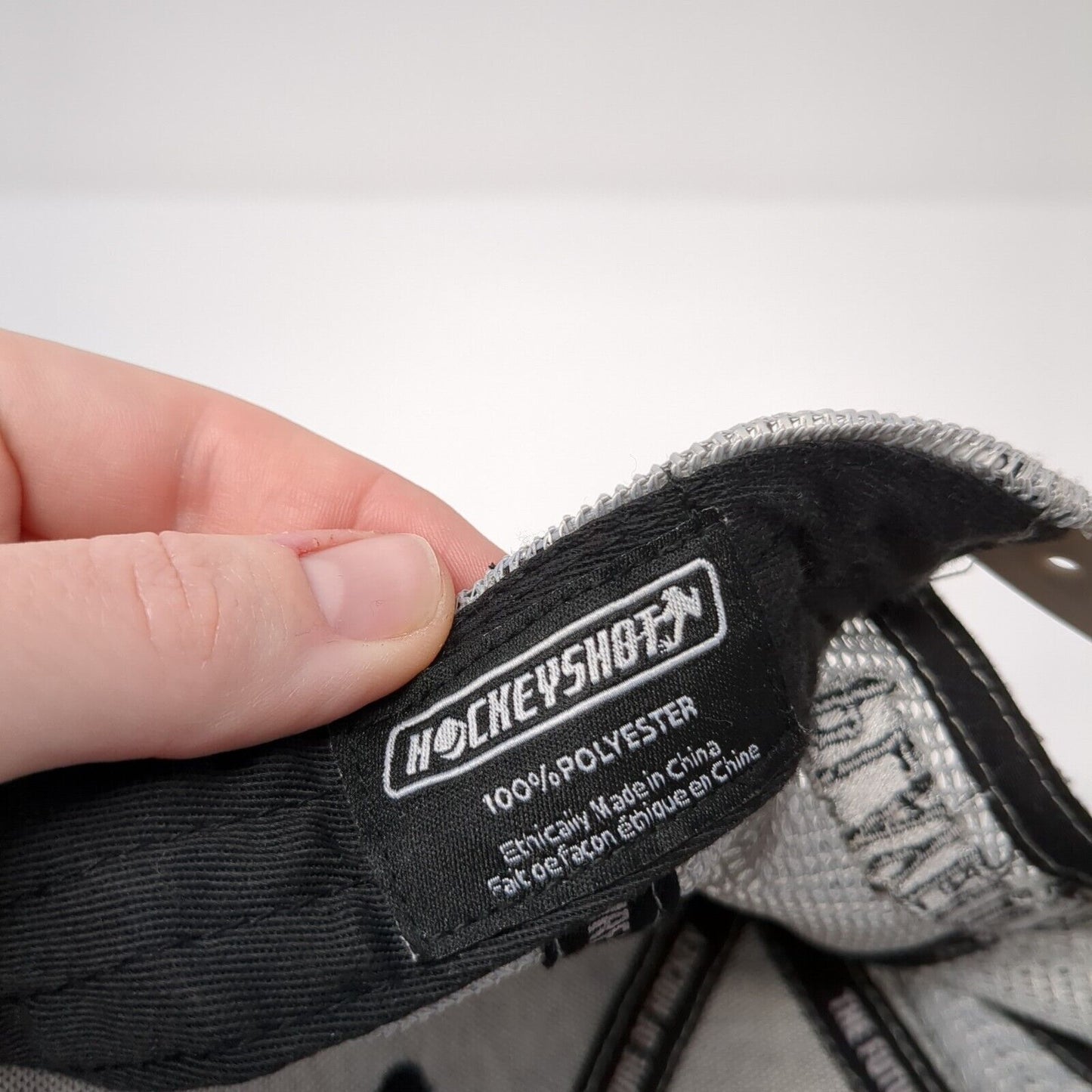 Hockey Shot Snapback Mesh Back Trucker Hat Black One Size Embroidered