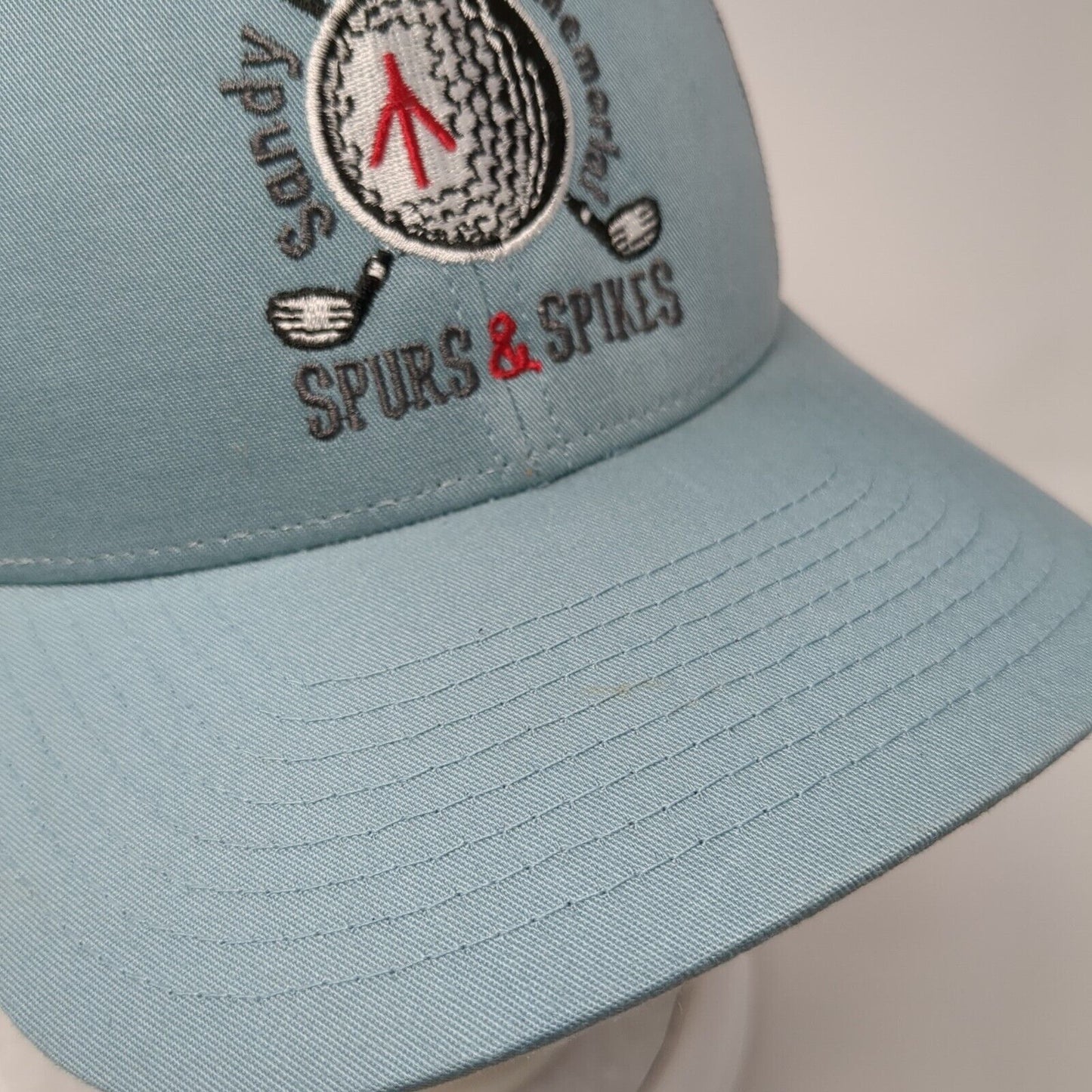 Sandy McLeod Memorial Spurs & Spikes Trucker Hat Blue M/L Mesh Back