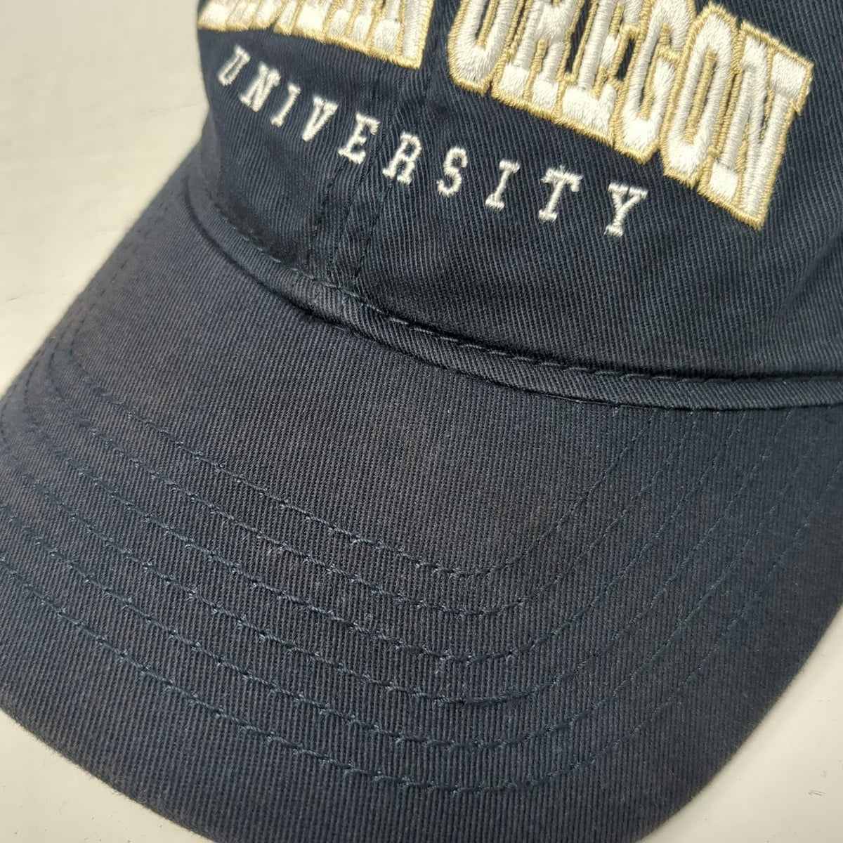 Legacy Eastern Oregon University NCAA Cap Blue Gold White One Size Slideback Hat