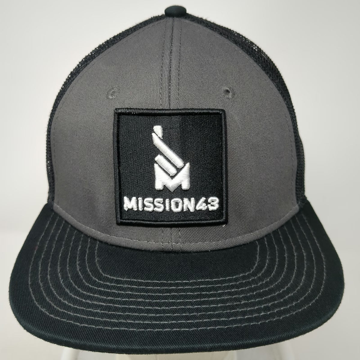 MISSION43 Trucker Hat Black One Size Snapback Mesh Flat Brim Logo Patch Lead