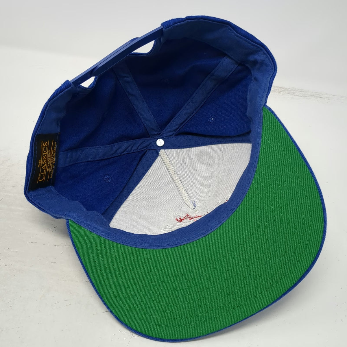 Yupoong 5 Panel Blue One Size Snapback Green Underbrim Empire Script Logo Hat
