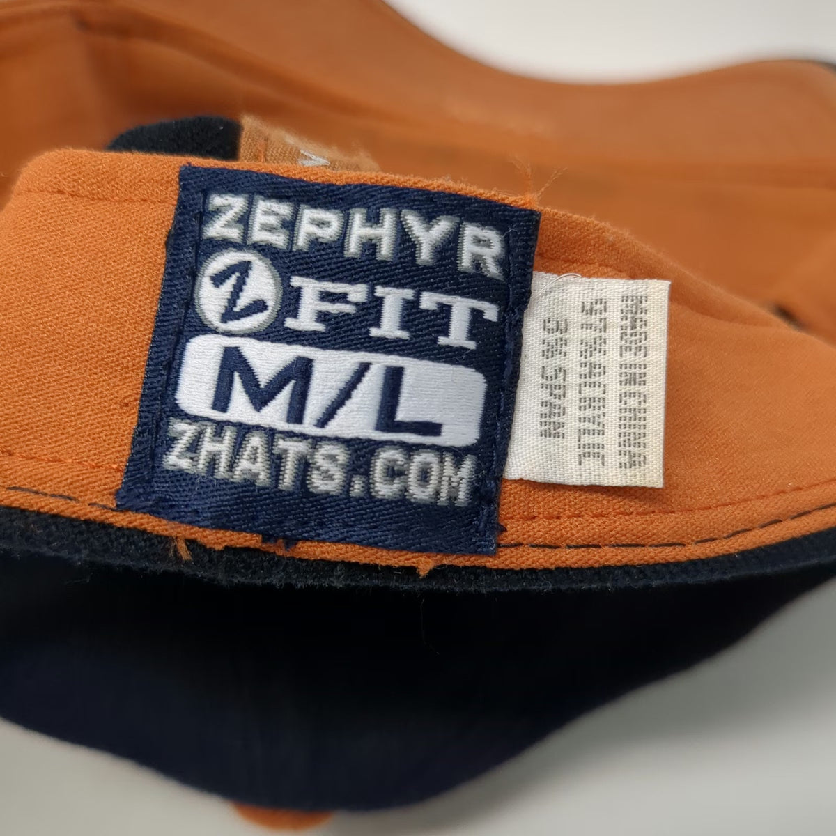Texas Longhorns NCAA Zephyr Cap Blue L Stretch Fit Embroidered Hat Orange Brim