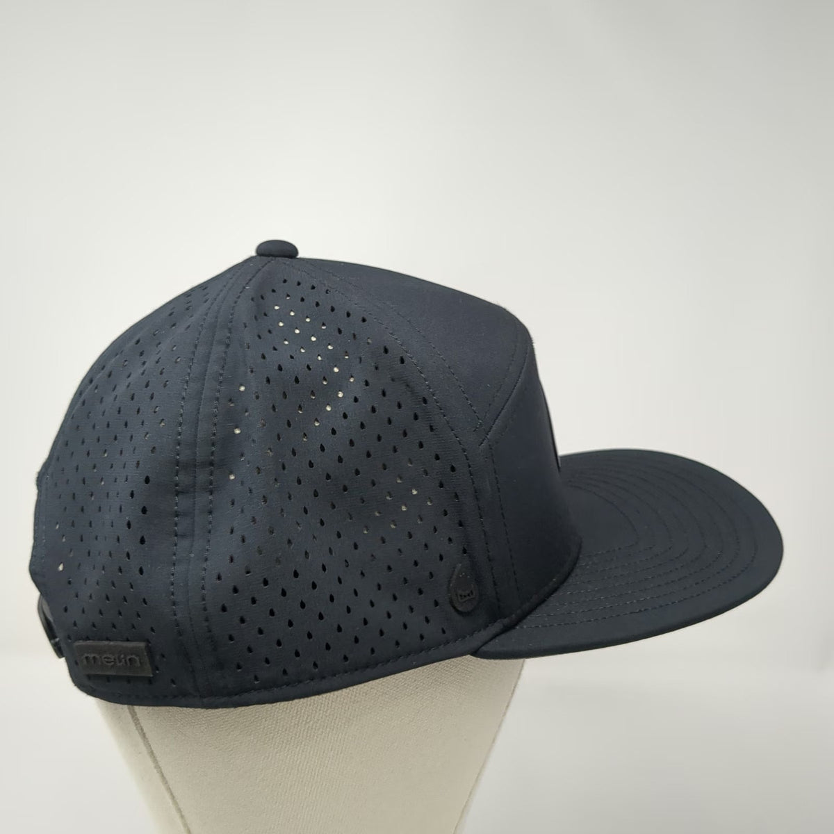 Melin Trucker Hat Black L Hydro Trenches Perforated Snapback Brim Rubber Logo