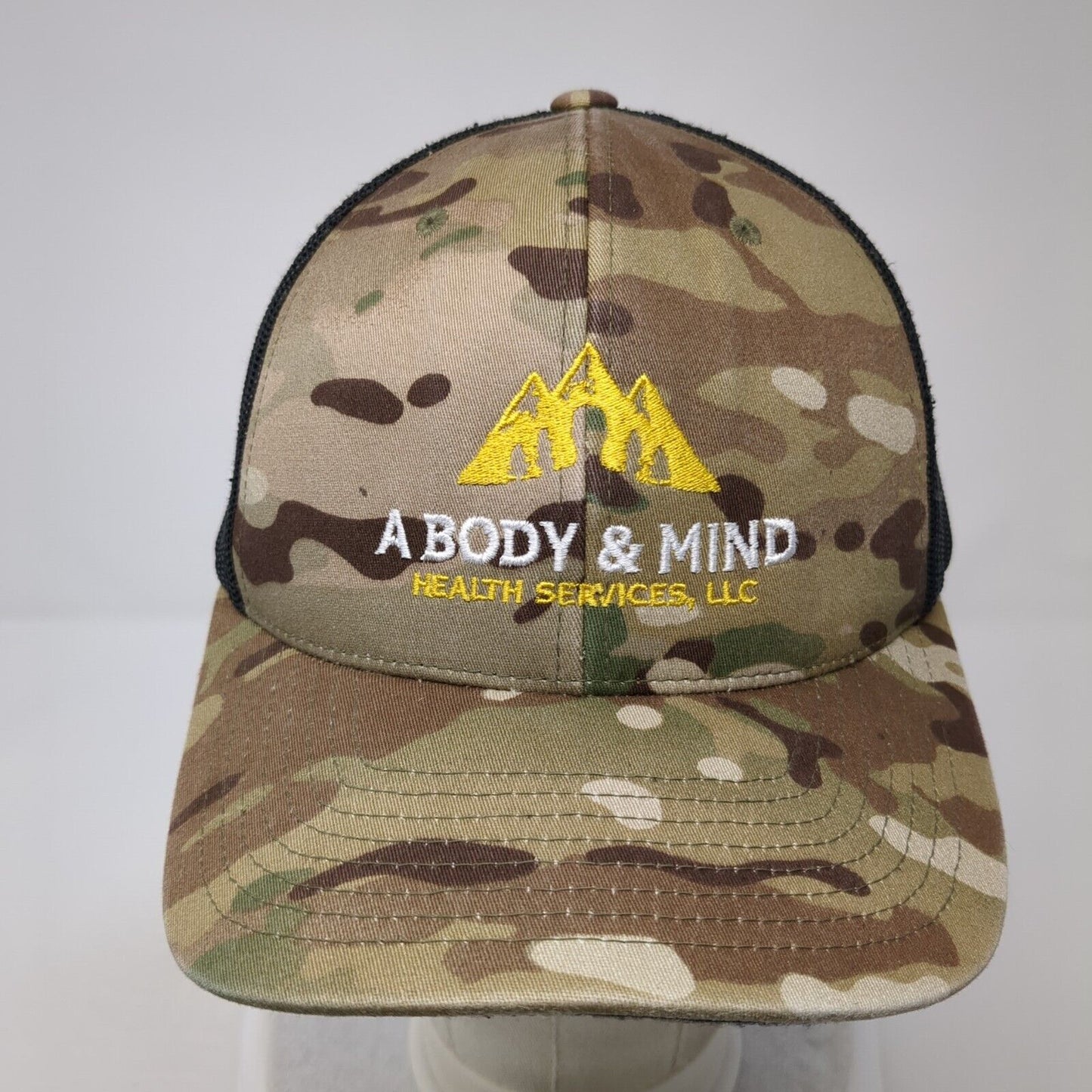 A Body & Mind Health Services LLC Snapback Trucker Hat Camo OS Mesh Back Yupoong