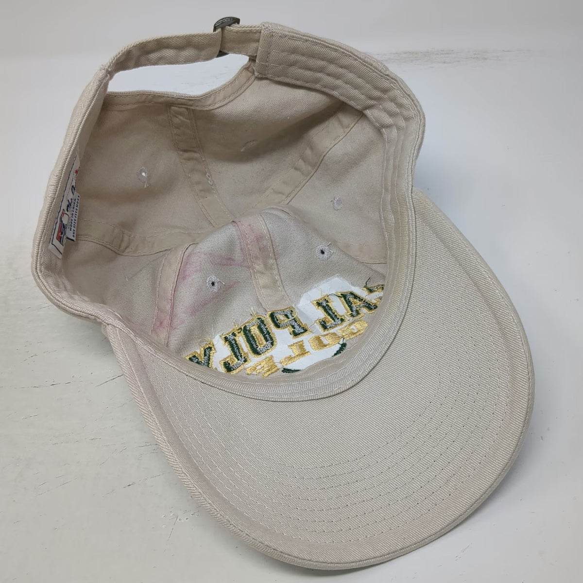 The Game Cal Poly Mustangs NCAA Golf Beige One Size Cap Slideback Embroidery